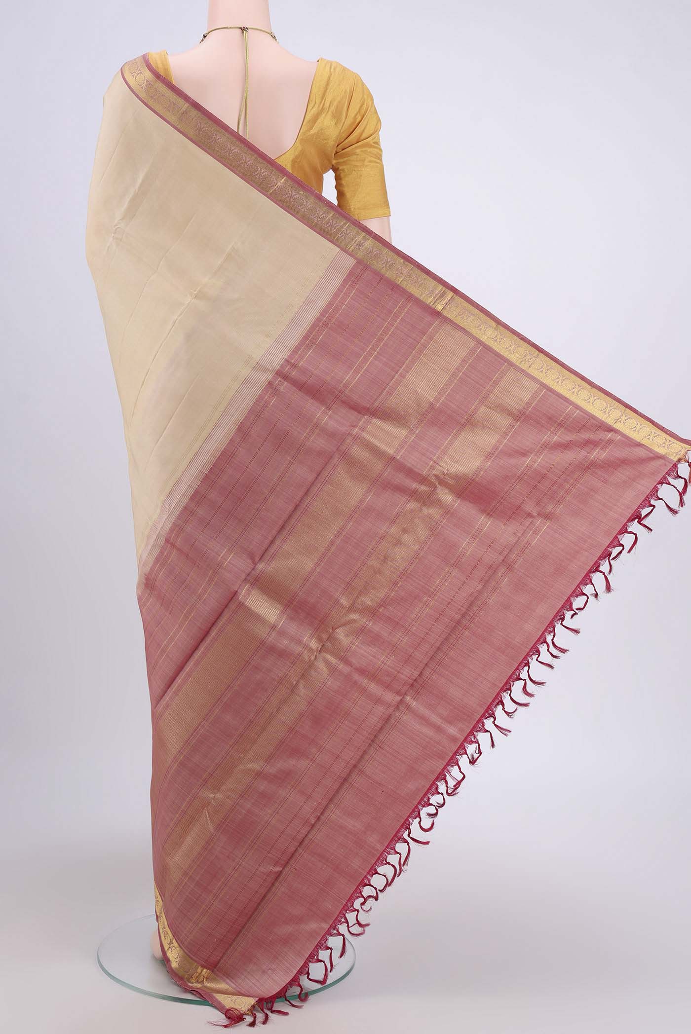 Flat view of Beige Dual Tone Kanjivaram Saree with Plain Body and Zari Border. 