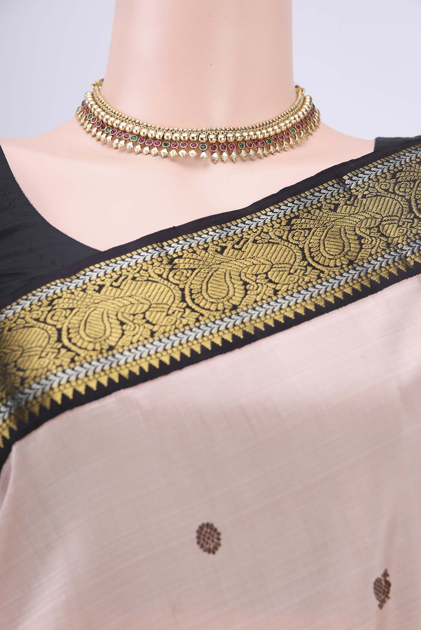 Border image of Peach Dual Tone Kanjivaram Silk Saree with Thread Butta on the body and Zari Border. 