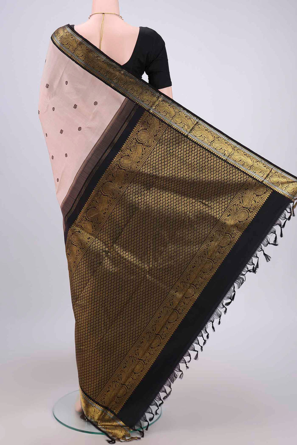 Flat view of Peach Dual Tone Kanjivaram Silk Saree with Thread Butta on the body and Zari Border. 