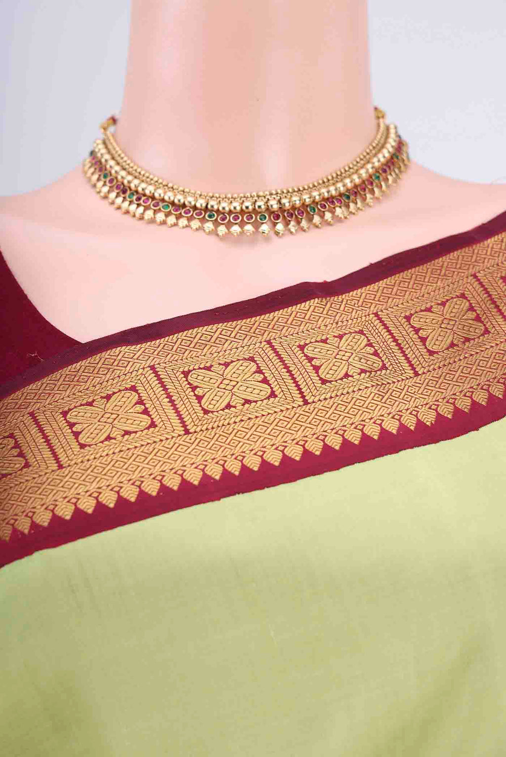 Border image of Acid Green Kanjivaram Saree with Plain Body and Zari Border. 