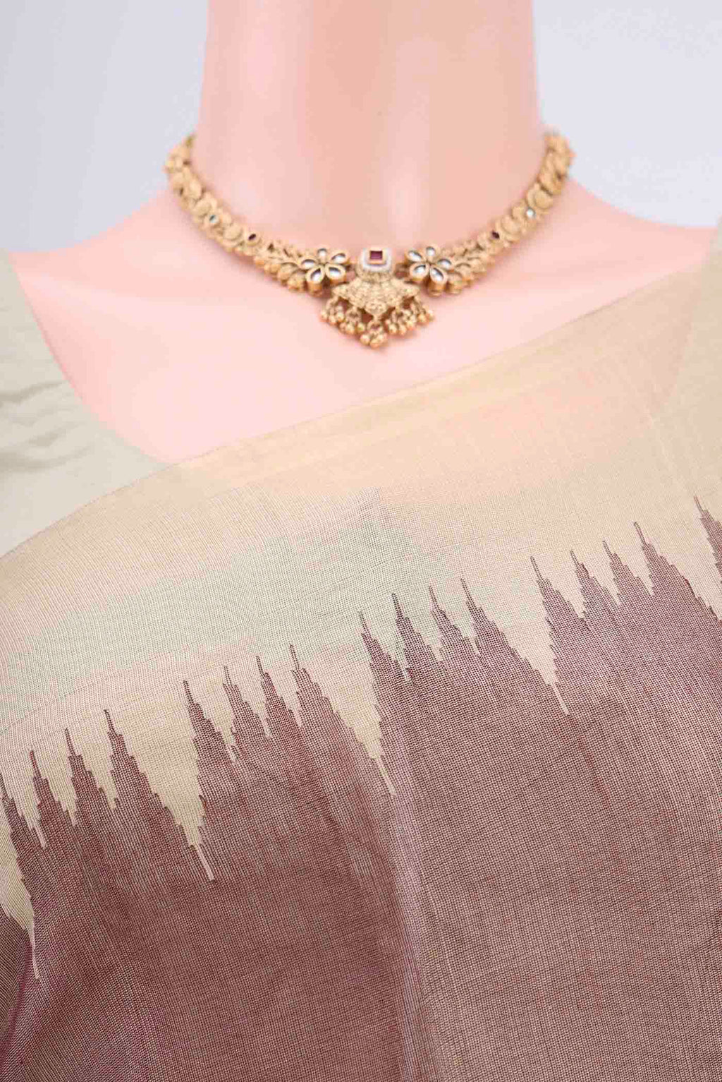 Border image of Brown Tussar Silk Saree with Plain Body and Temple Border