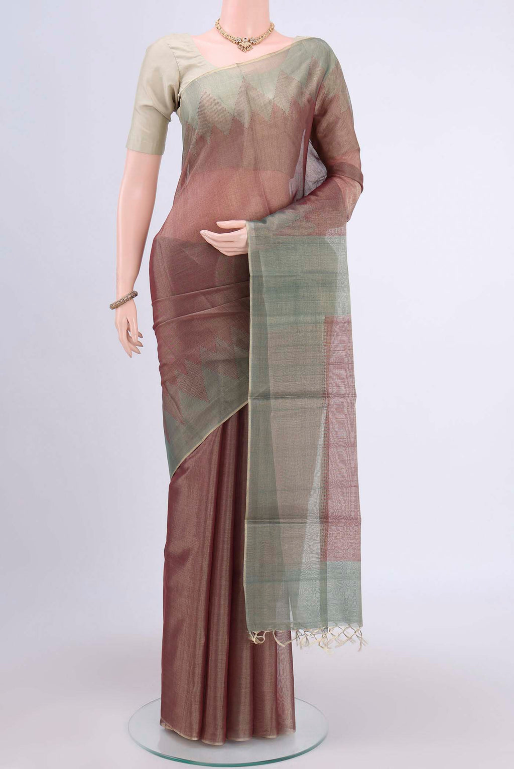 Brown Tussar Silk Saree with Plain Body and Temple Border displayed on a mannequin