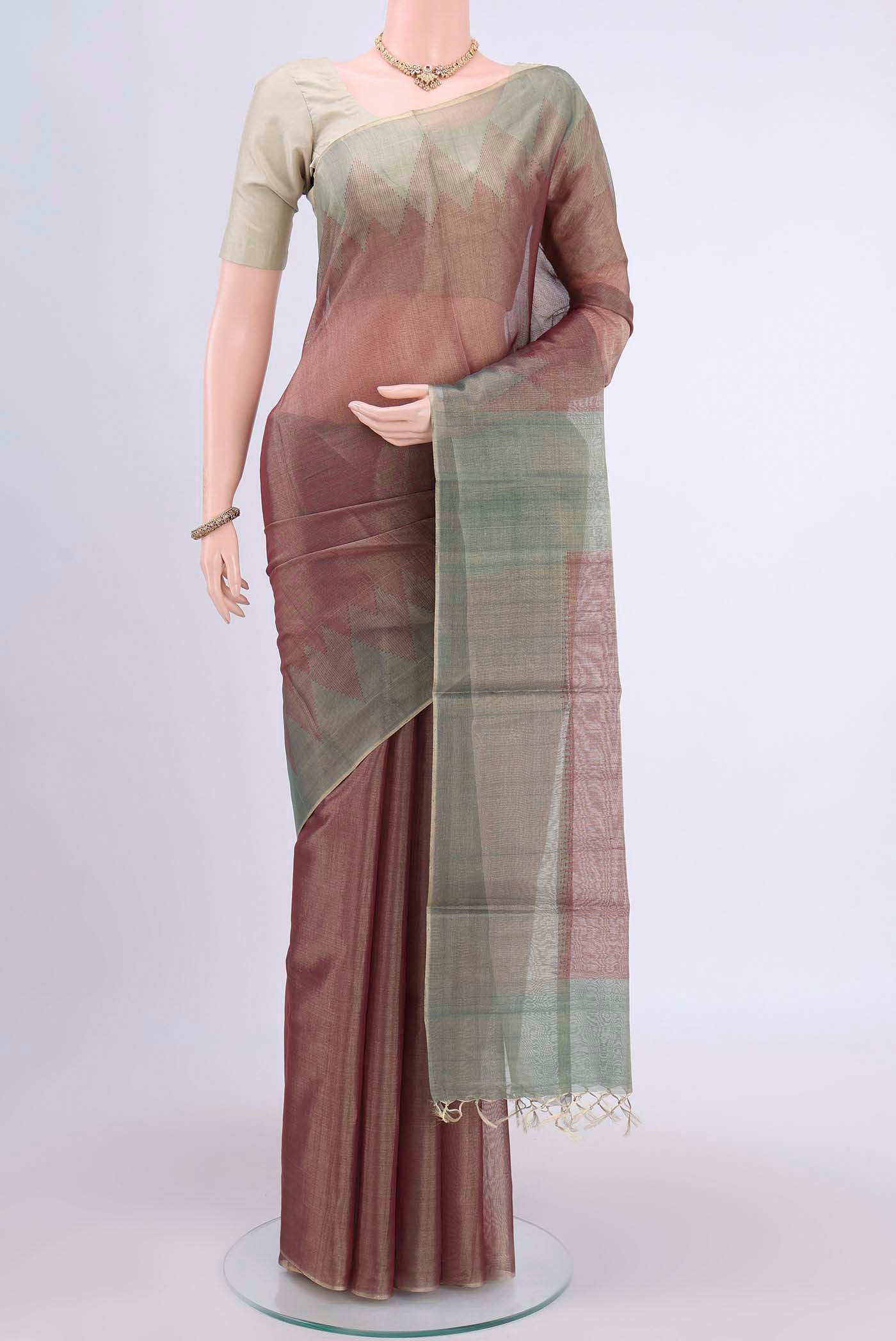 Brown Tussar Silk Saree with Plain Body and Temple Border displayed on a mannequin