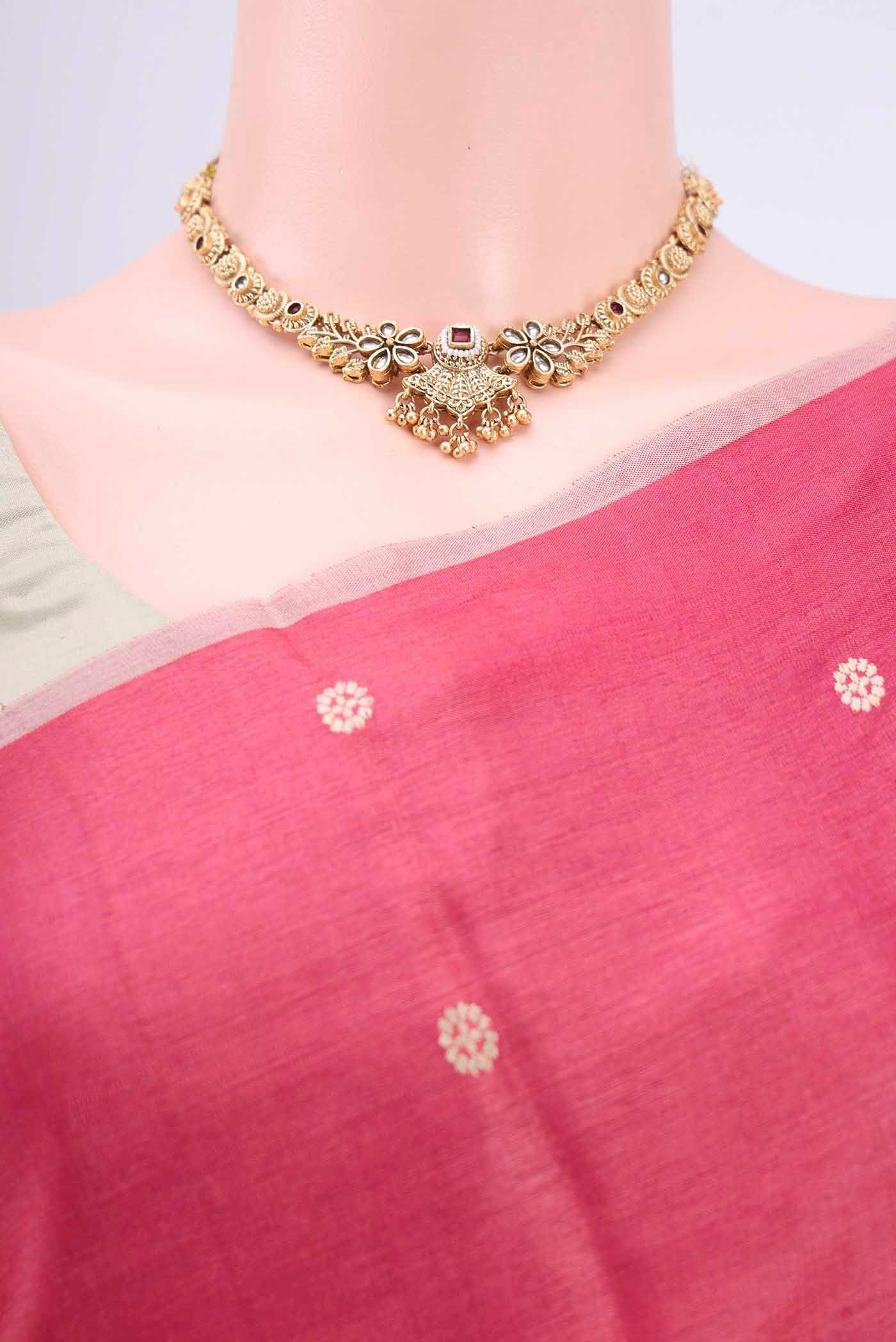 Border image of Pink Tussar Silk Saree with Thread Butta on the body and Plain Border