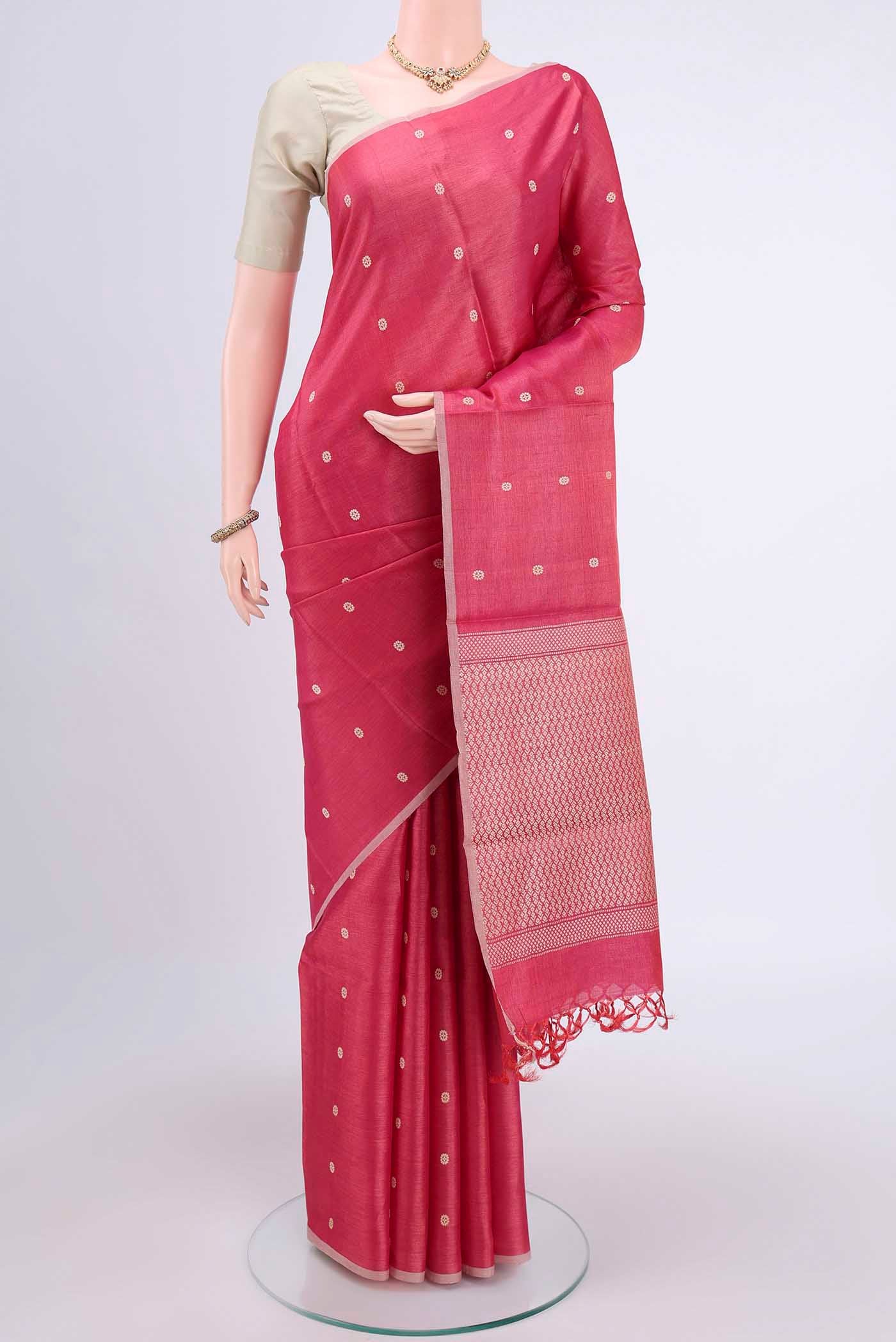 Pink Tussar Silk Saree with Thread Butta on the body and Plain Border displayed on a mannequin