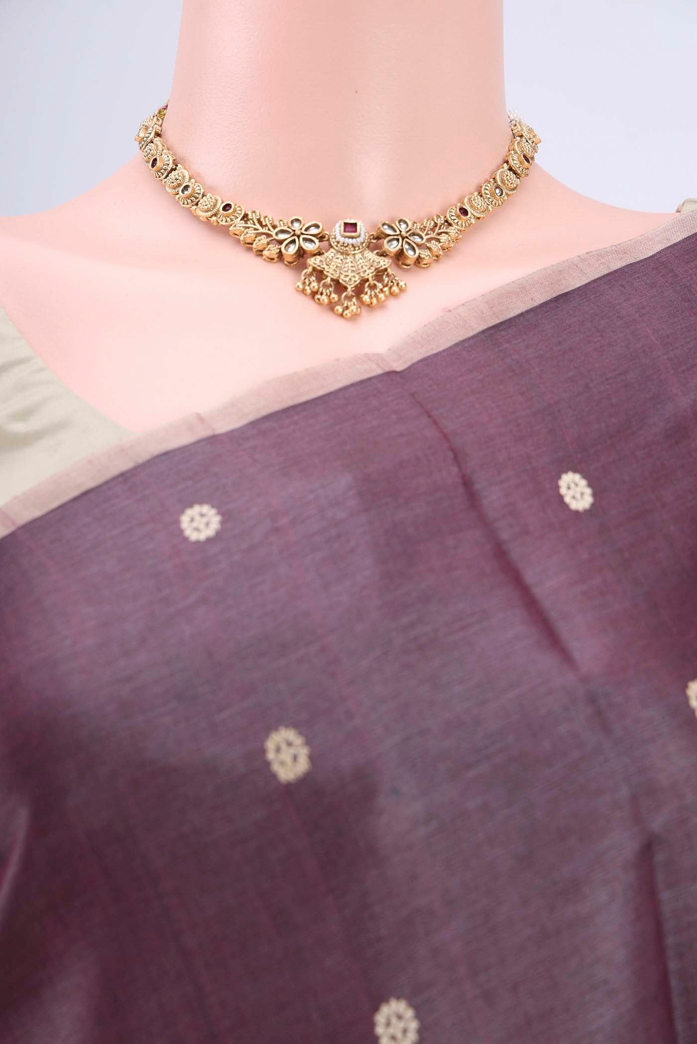 Border image of Dark Mauve Tussar Silk Saree with Thread Butta on the body and Plain Border