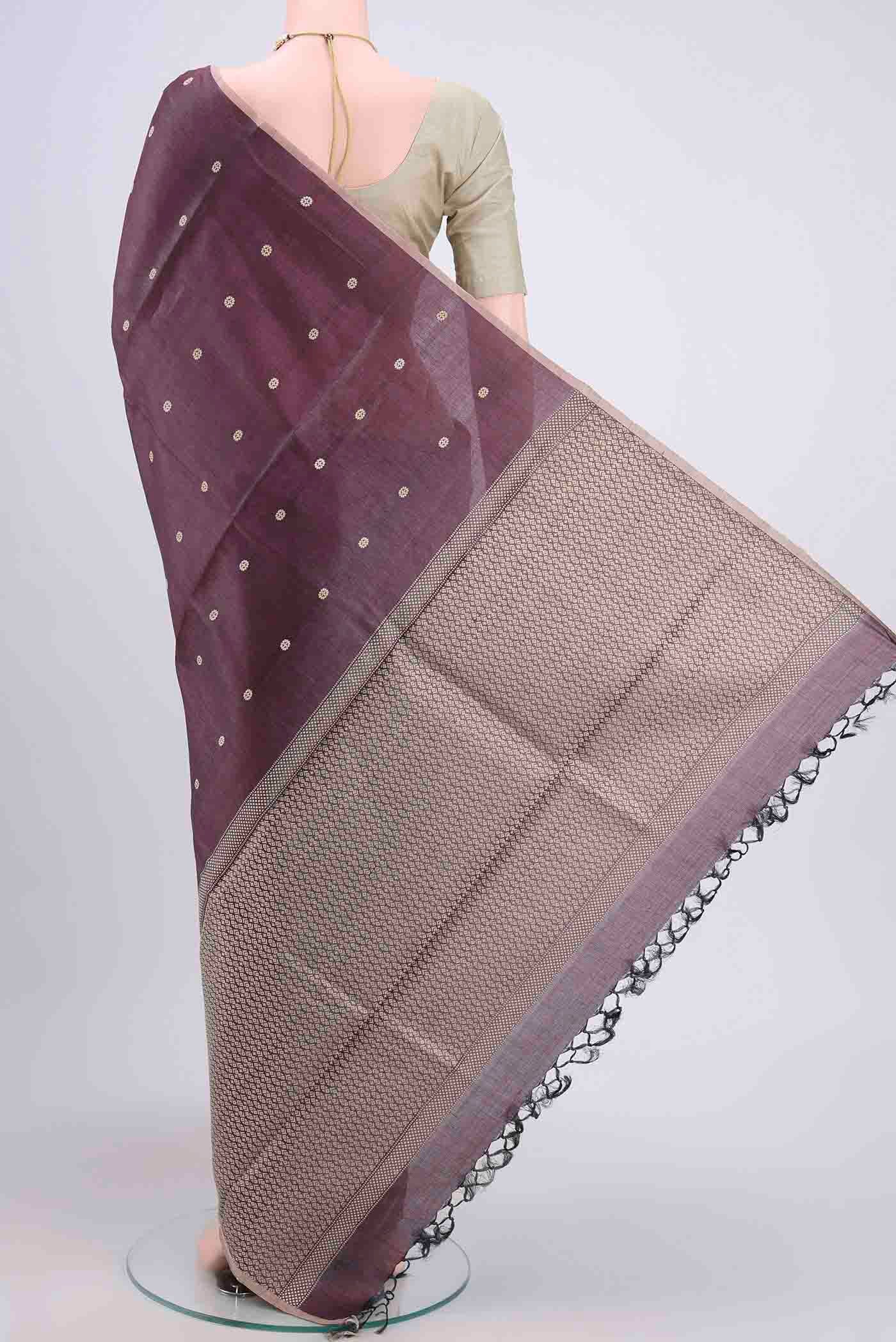 Flat view of Dark Mauve Tussar Silk Saree with Thread Butta on the body and Plain Border