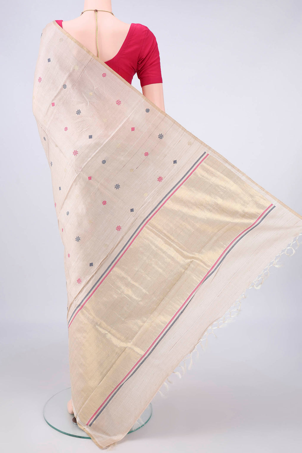 Flat view of Beige MP Tussar Saree with Thread Butta on the body and Zari Border. 