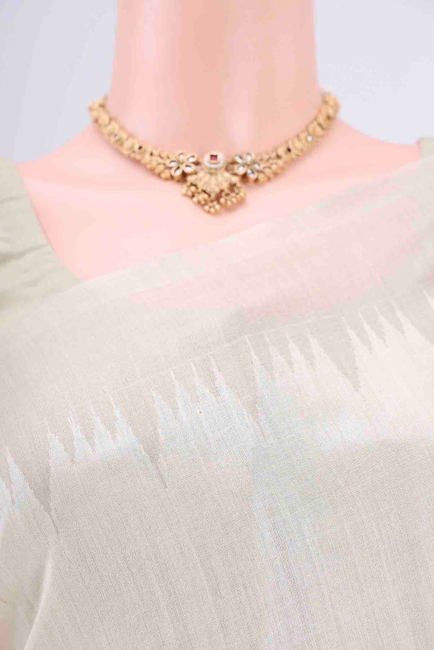 Border image of Off White Tussar Silk Saree with Plain Body and Temple Border