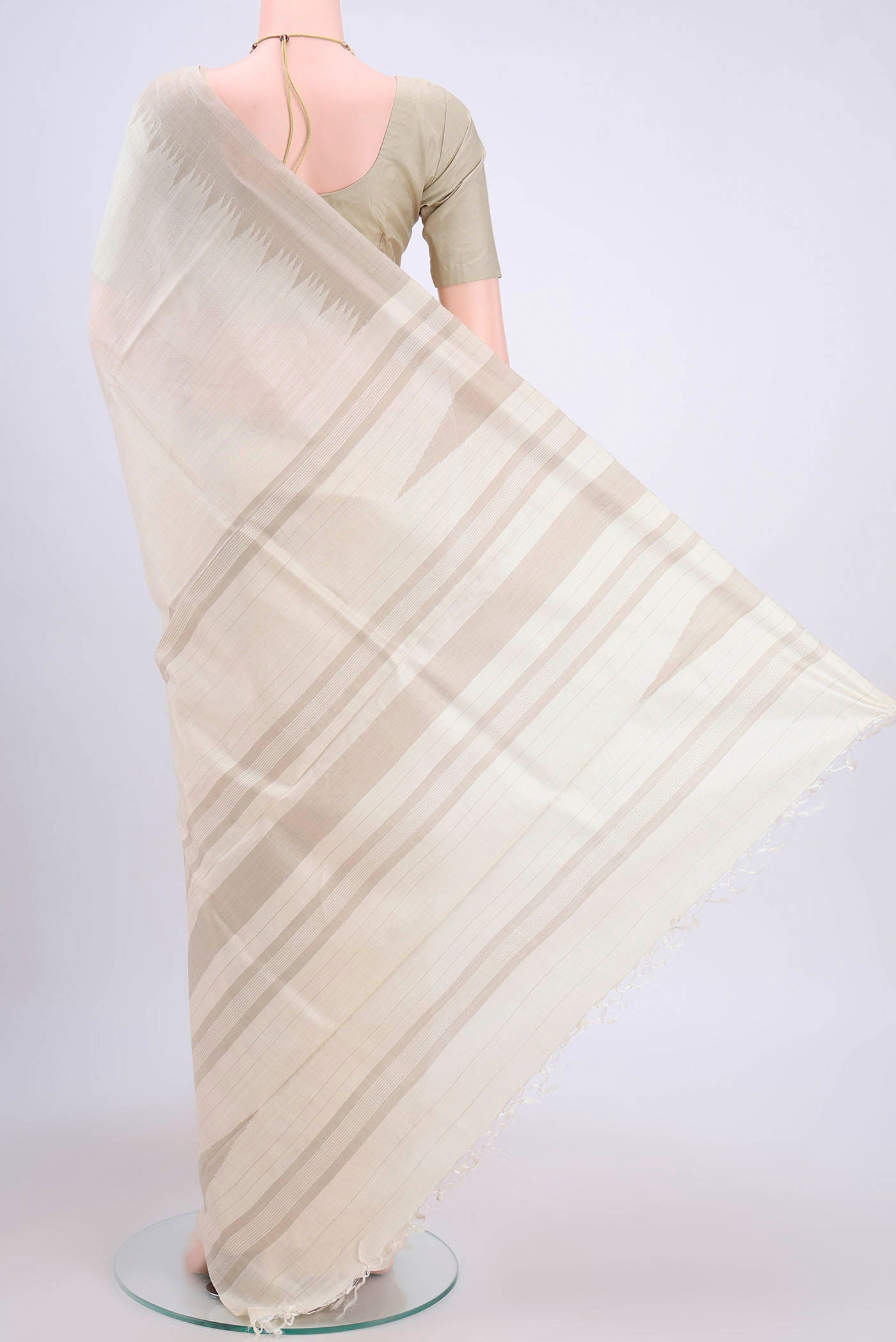 Flat view of Off White Tussar Silk Saree with Plain Body and Temple Border