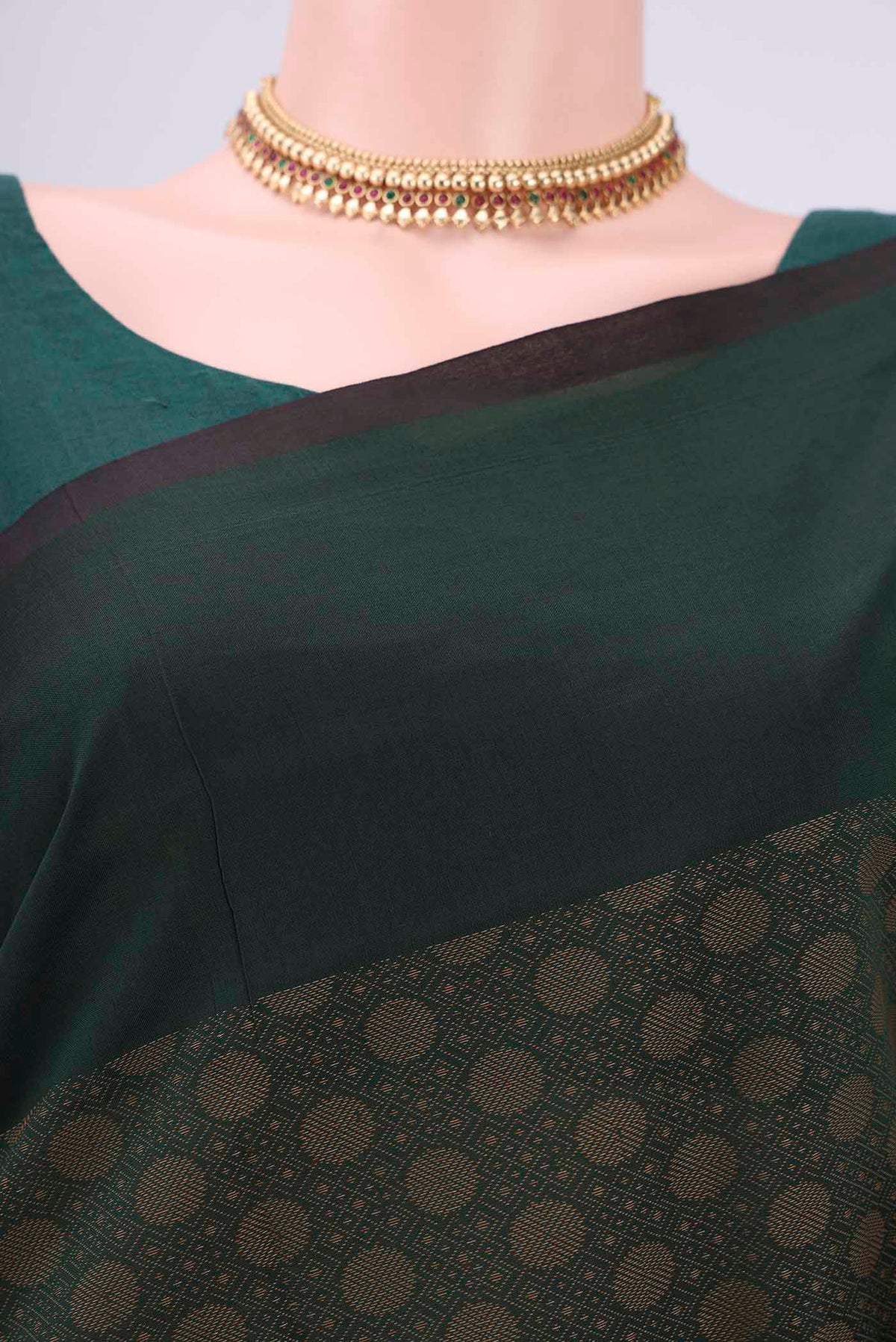 Border image of Green Blended Poly Cotton Saree with Jacquard design on the body and Plain Border. 