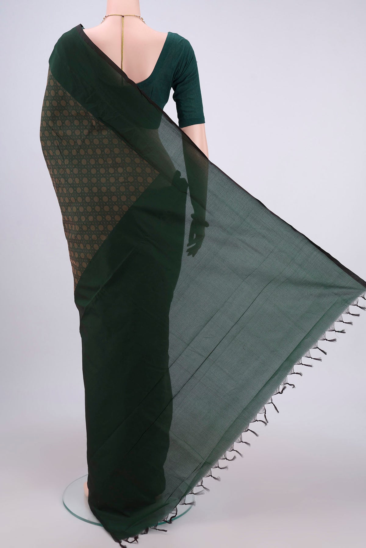 Flat view of Green Blended Poly Cotton Saree with Jacquard design on the body and Plain Border. 