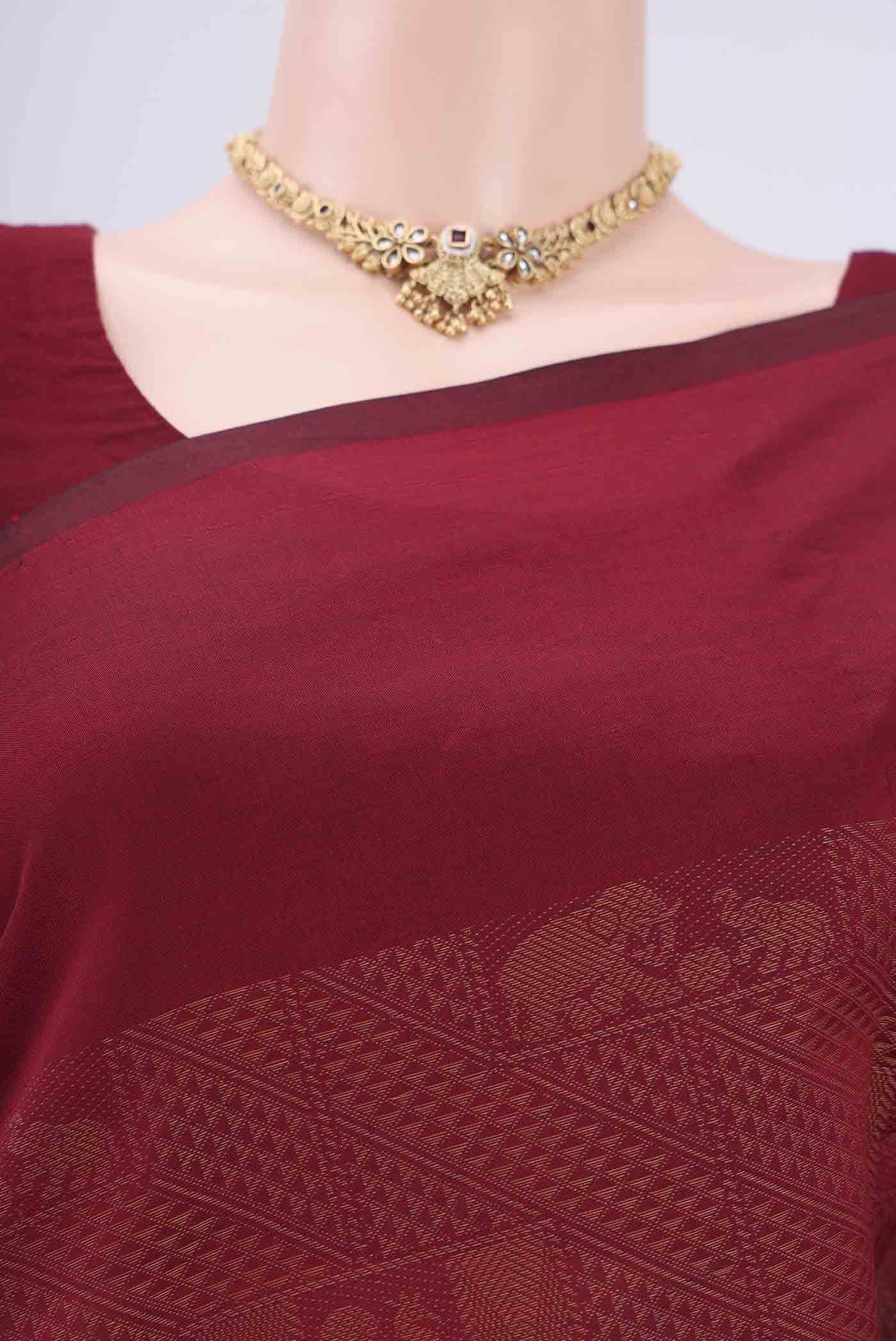 Border image of Maroon Blended Poly Cotton Saree with Jacquard design on the body and Plain Border. 