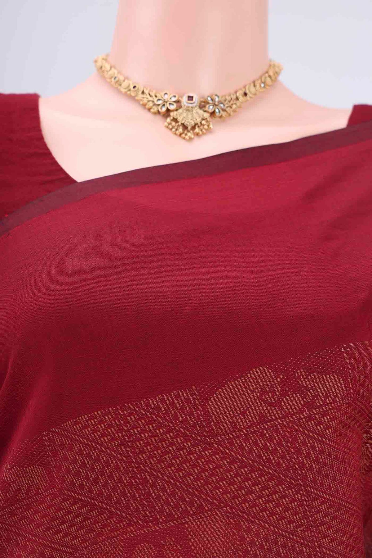 Border image of Maroon Blended Poly Cotton Saree with Jacquard design on the body and Plain Border. 