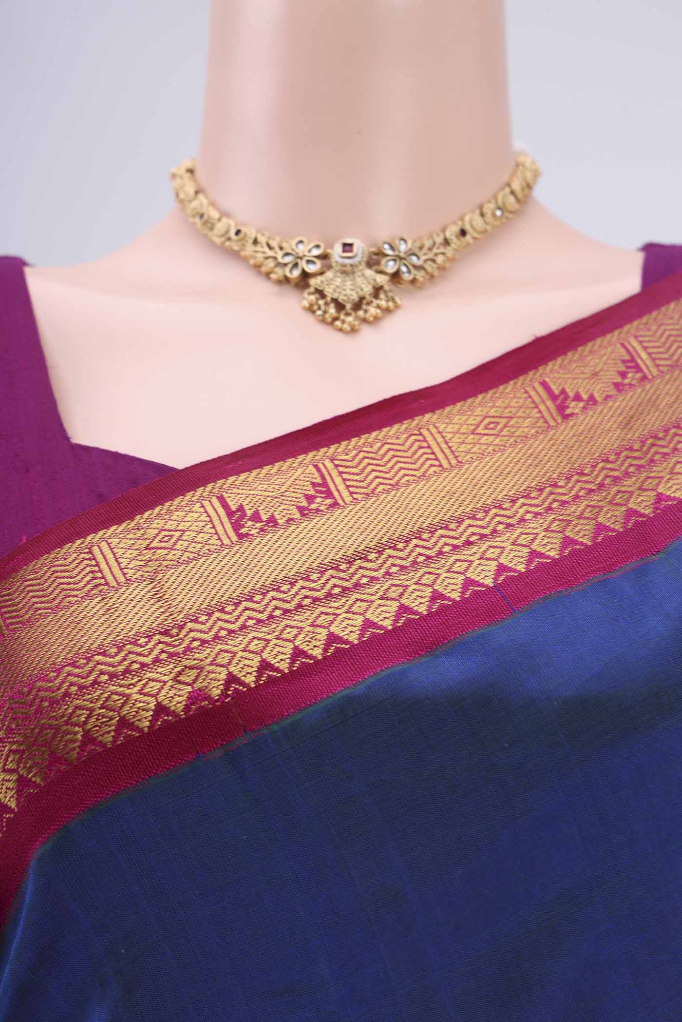 Border image of Peacock Blue Blended Coimbatore Silk Cotton Saree with Plain Body and Zari Border. 