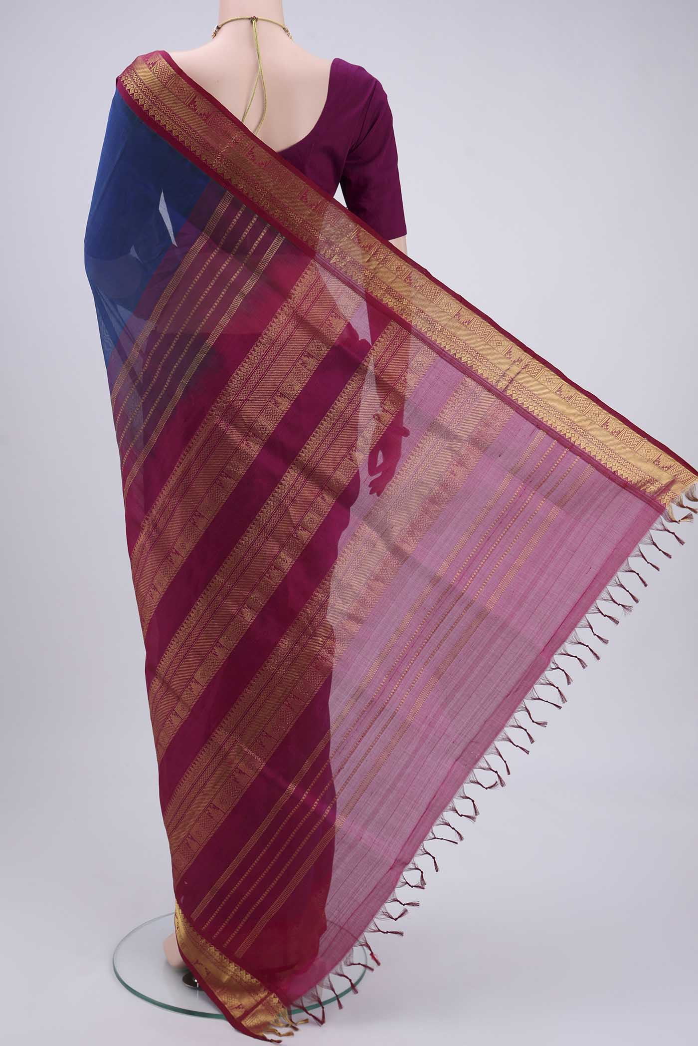 Flat view of Peacock Blue Blended Coimbatore Silk Cotton Saree with Plain Body and Zari Border. 