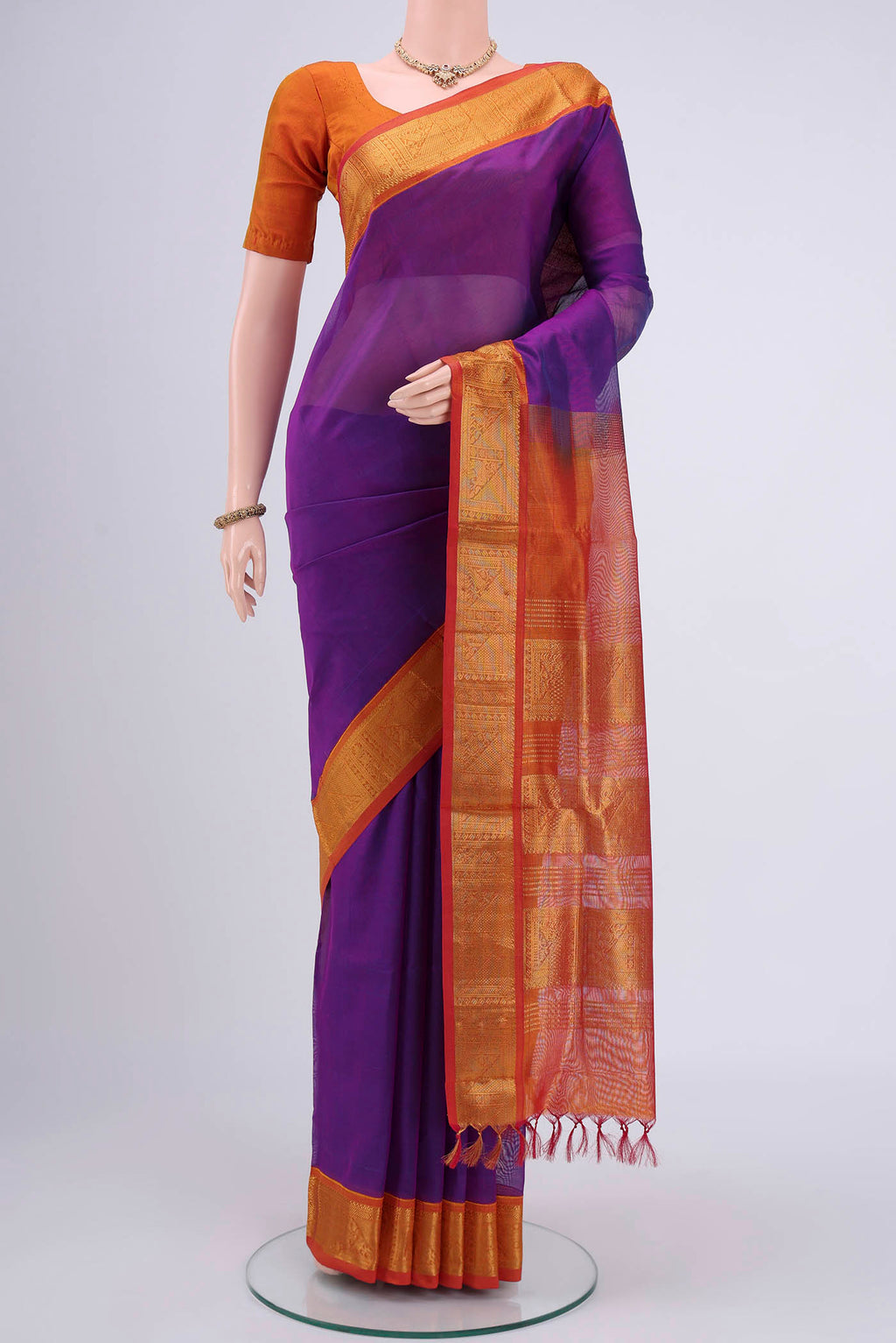 Purple Blended Coimbatore Silk Cotton Saree with Checked design on the body and Zari Border.  displayed on a mannequin