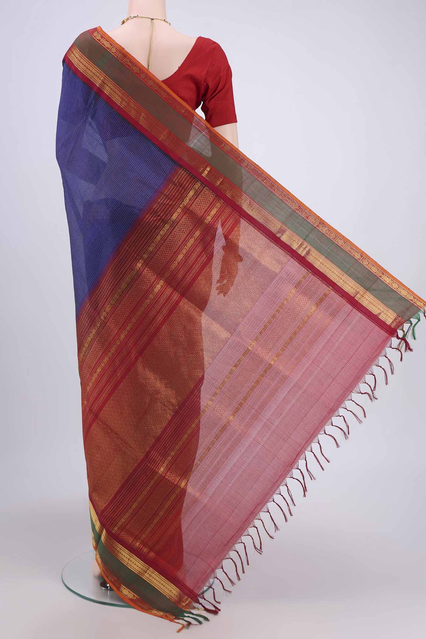 Flat view of Dark Blue Silk Cotton Saree with Checked design on the body and Zari Border. 