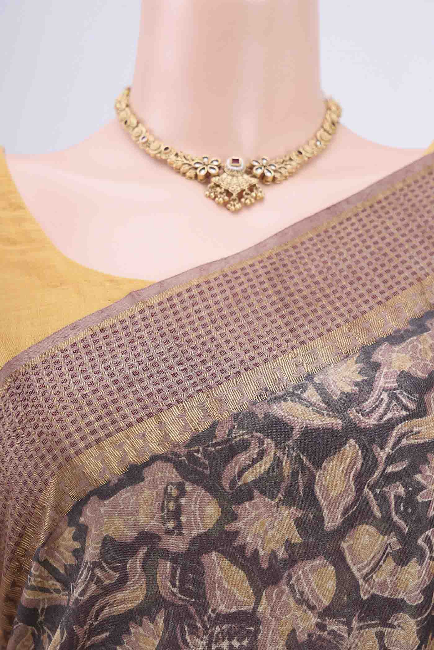 Border image of Davys Grey Tussar Silk Saree with kalamkari Print on the body and Zari Border. 