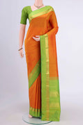 Mustard Kanchipuram Saree with Plain Body and Zari Border displayed on a mannequin