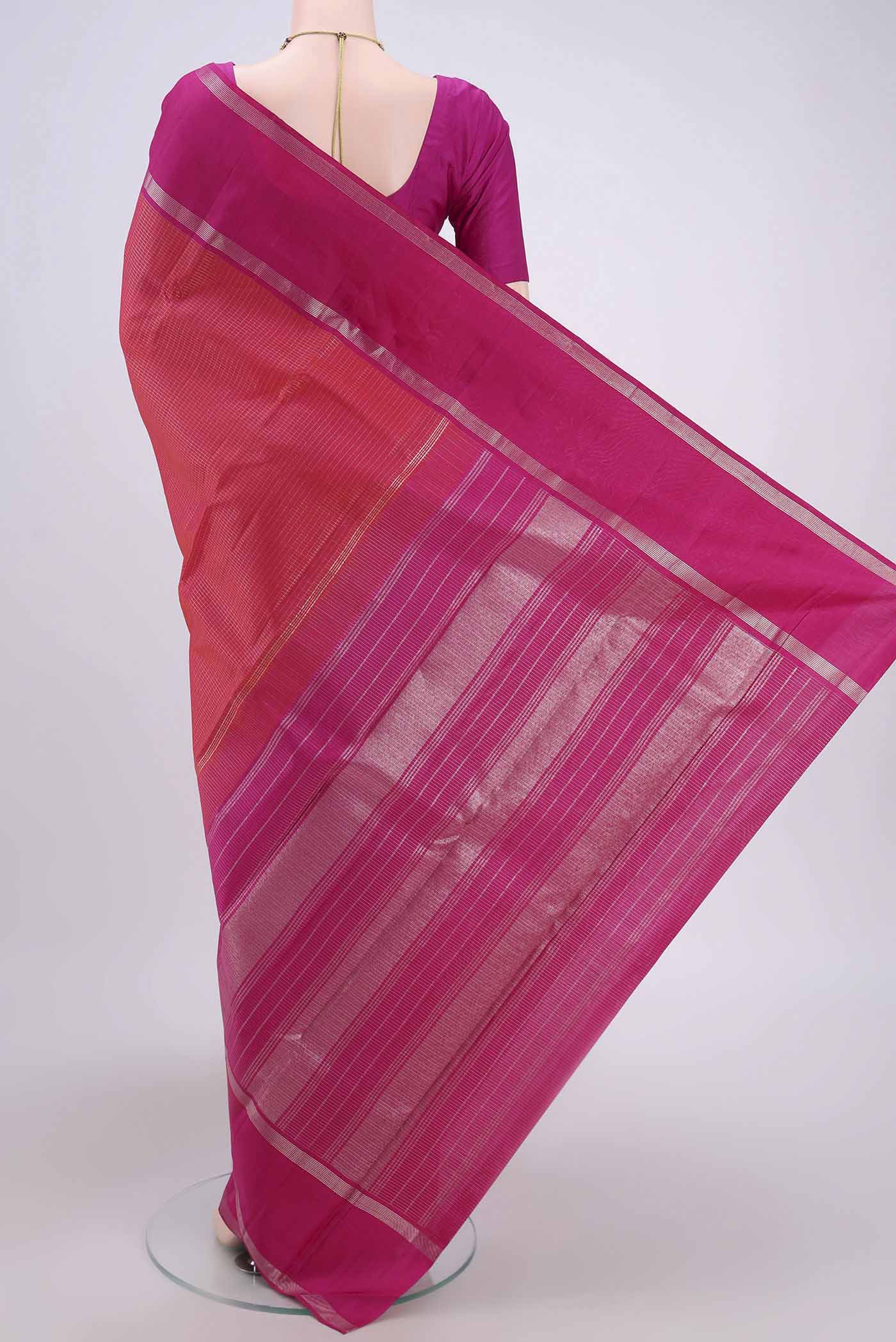 Flat view of Dark Pink Kanchipuram Silk Saree with Checked design on the body and Zari Border. 