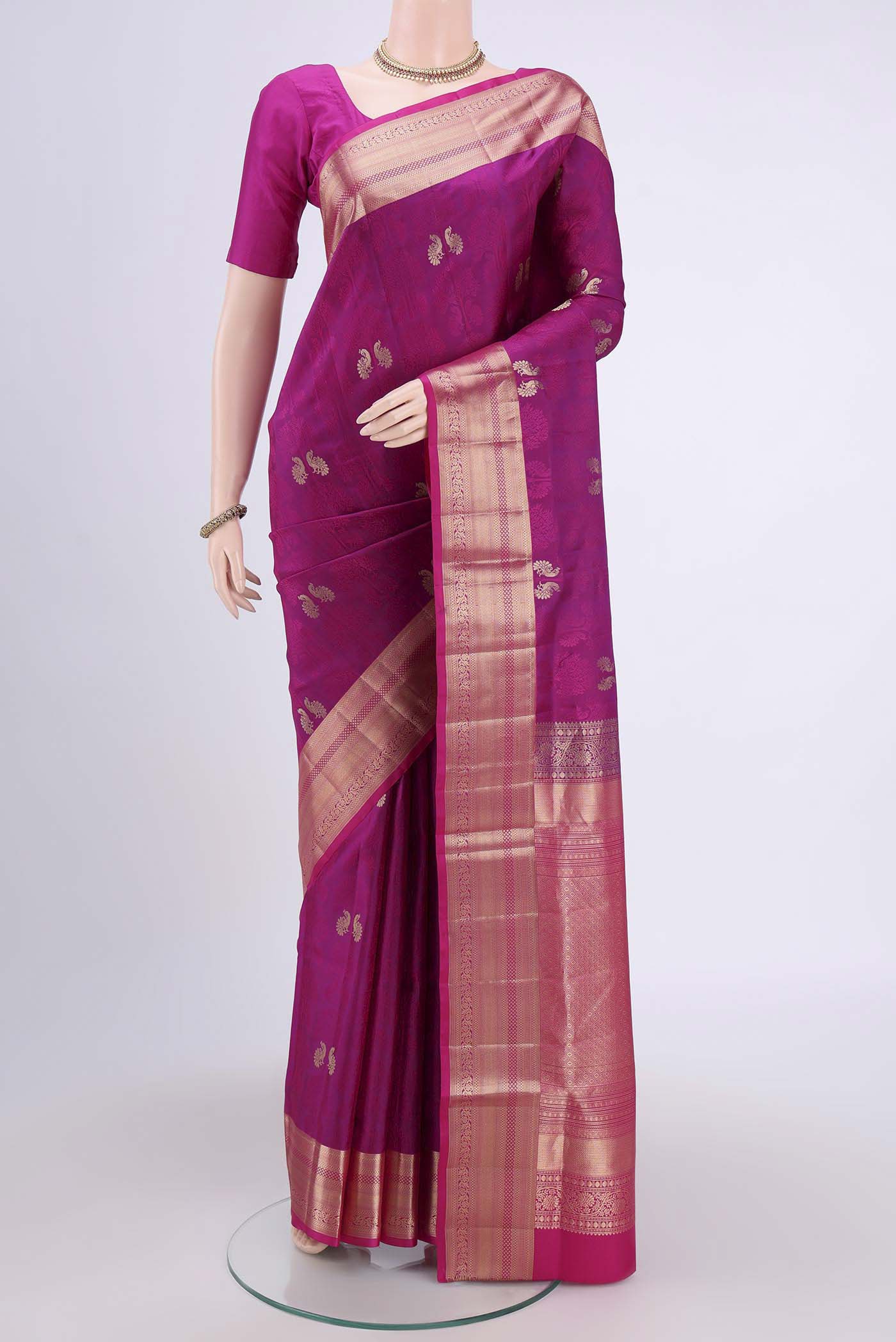 Magenta Dual Tone Soft Silk Saree with Jacquard With Zari Butta on the body and Zari Border.  displayed on a mannequin