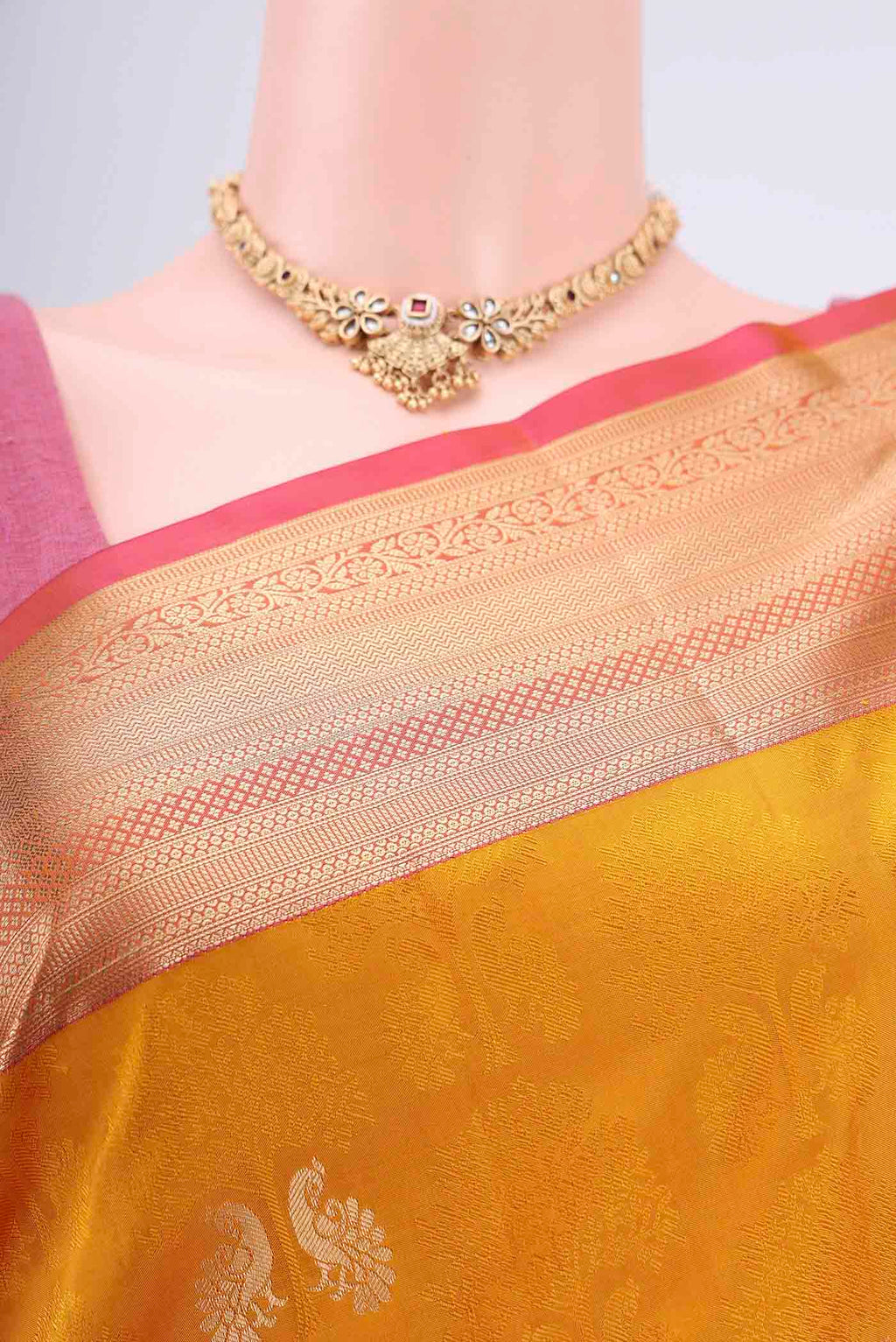 Border image of Mustard Soft Silk Saree with Jacquard With Zari Butta on the body and Zari Border. 