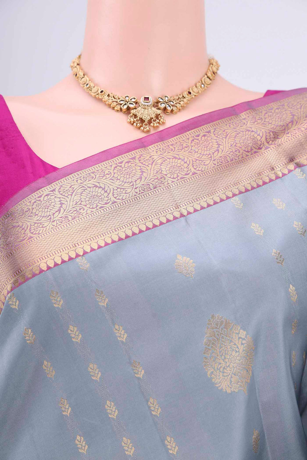 Border image of Grey Soft Silk Saree with Zari Butta on the body and Zari Border. 