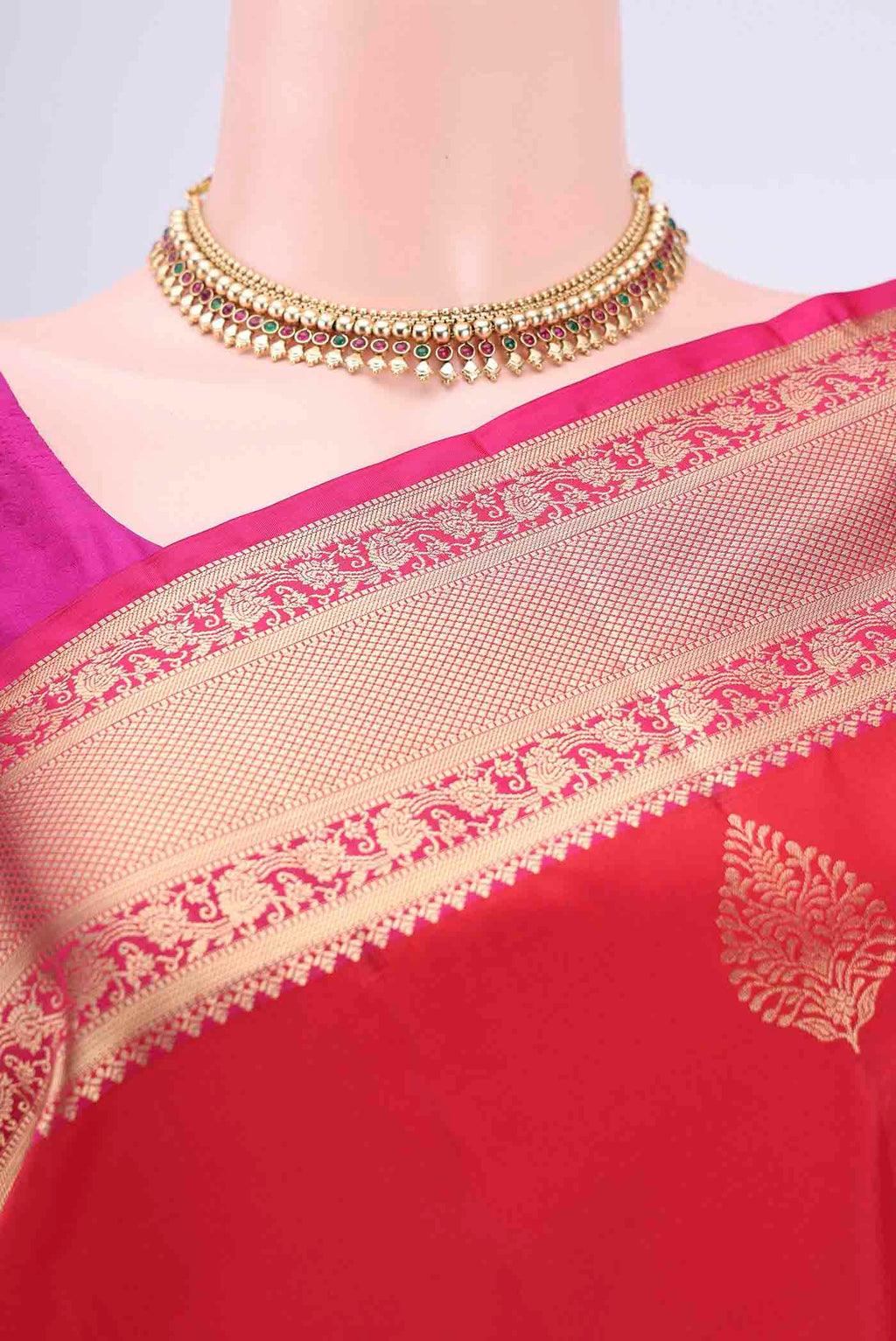 Border image of Red Soft Silk Saree with Zari Butta on the body and Fancy Border. 