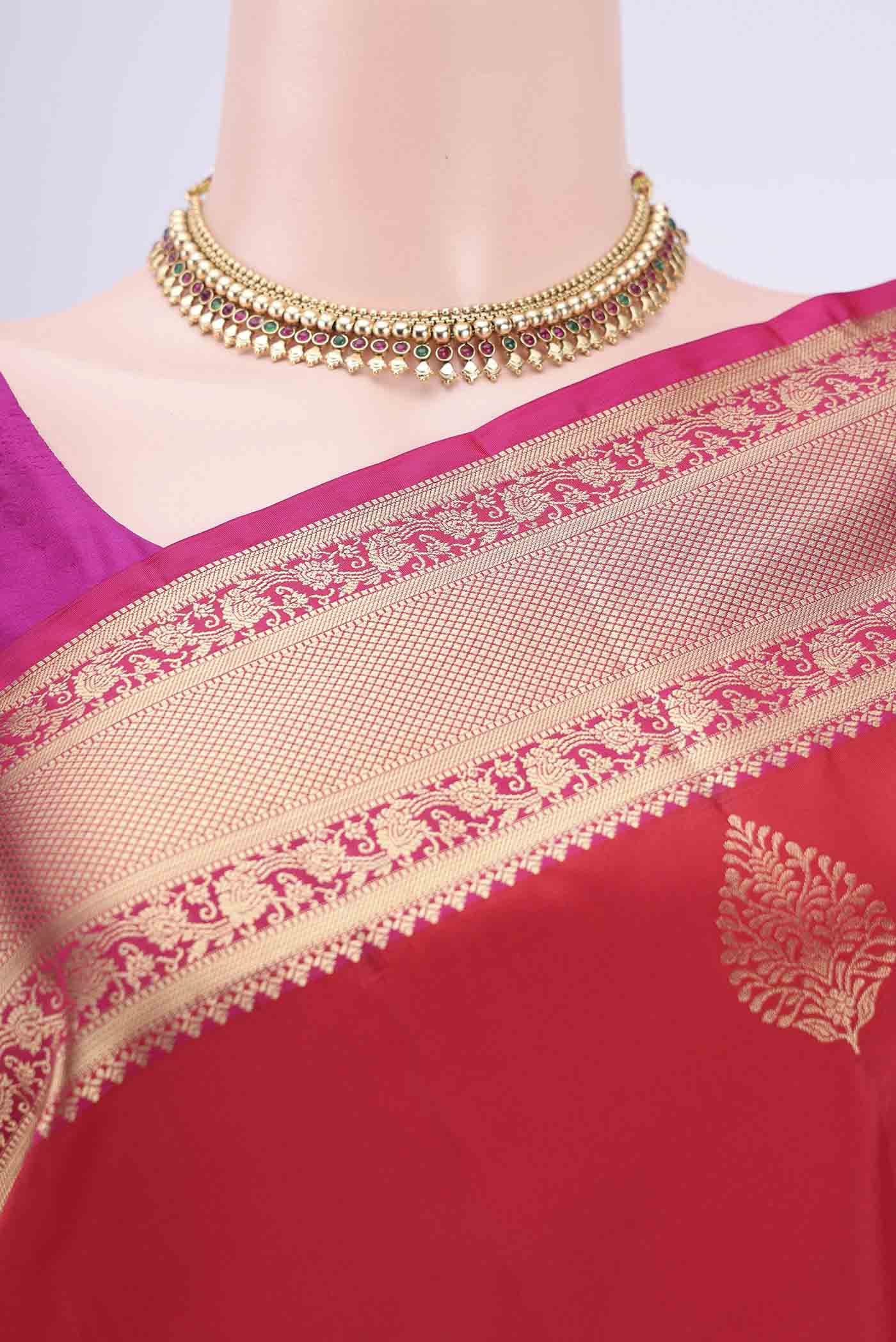 Border image of Red Soft Silk Saree with Zari Butta on the body and Fancy Border. 