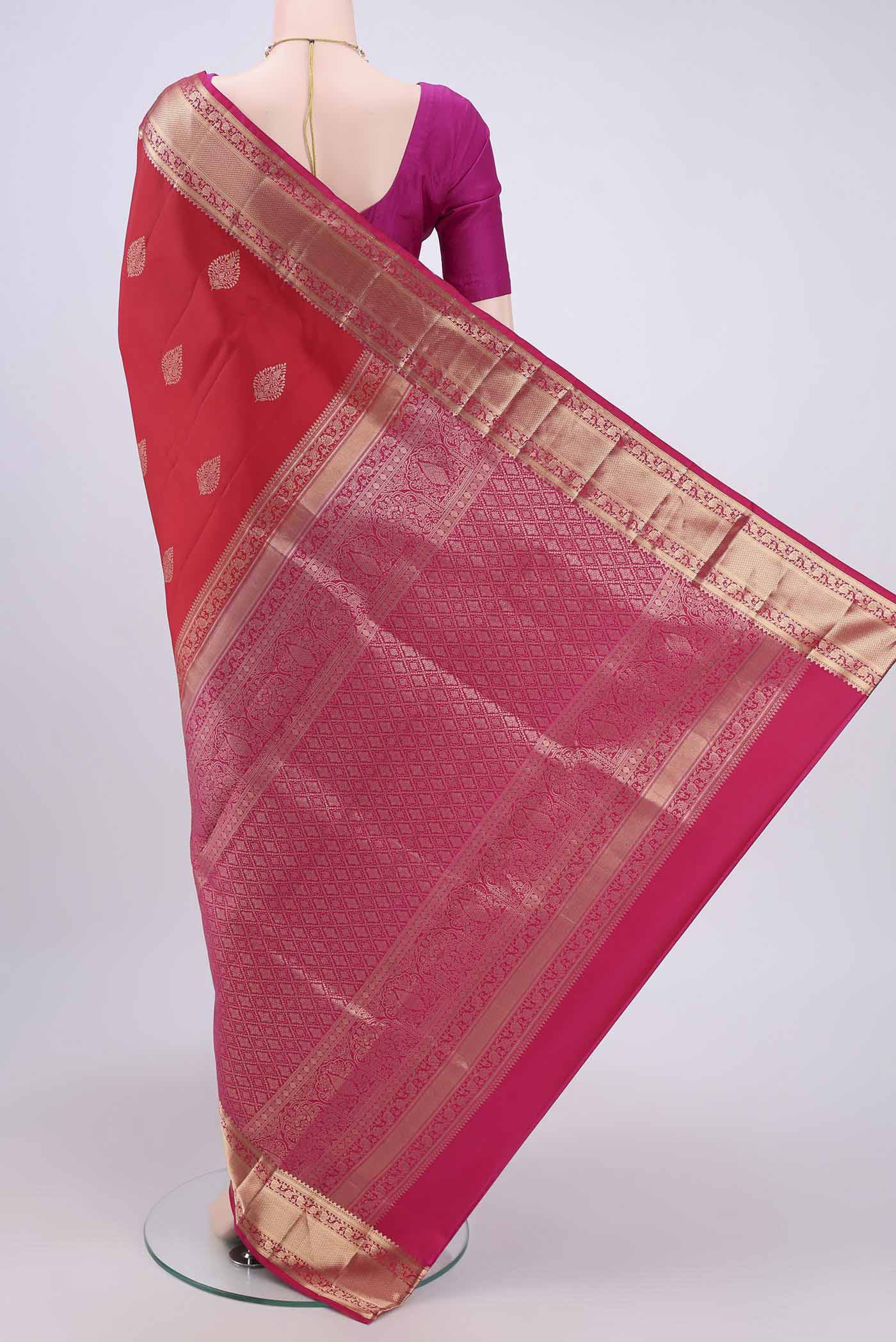 Flat view of Red Soft Silk Saree with Zari Butta on the body and Fancy Border. 