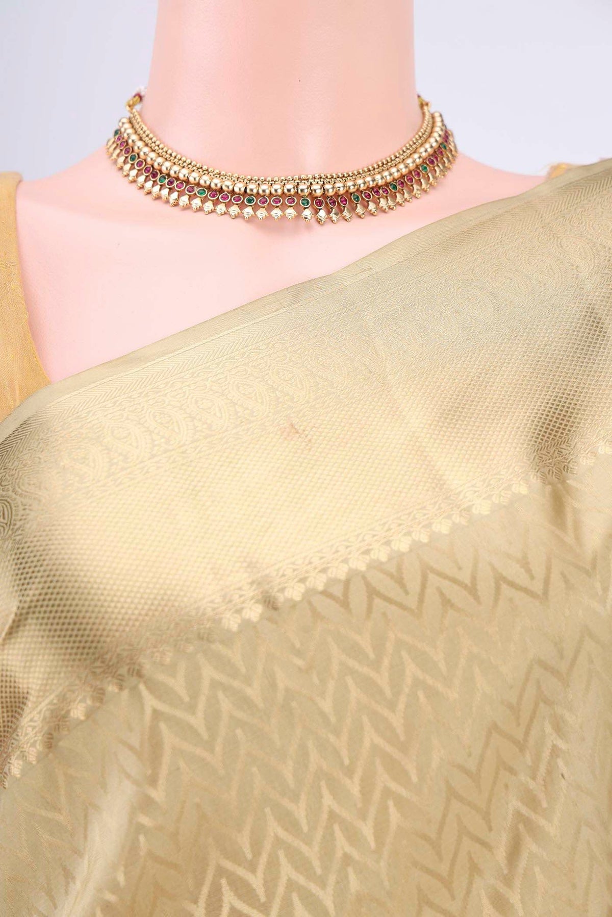 Border image of Dark Beige Soft Silk Saree with Zig Zag design on the body and Zari Border. 