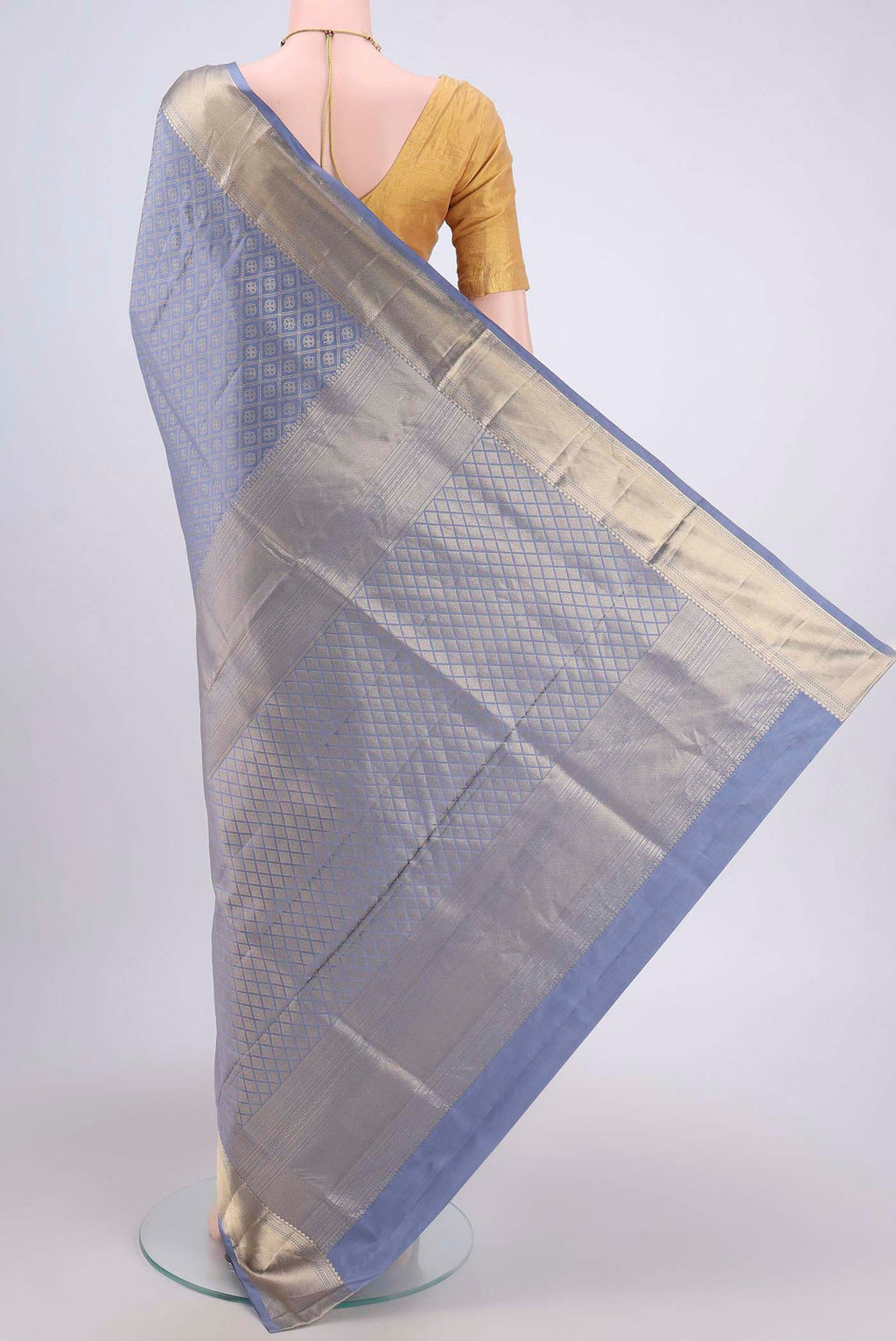 Flat view of Blue Grey Soft Silk Saree with Zari Brocade on the body and Zari Border. 