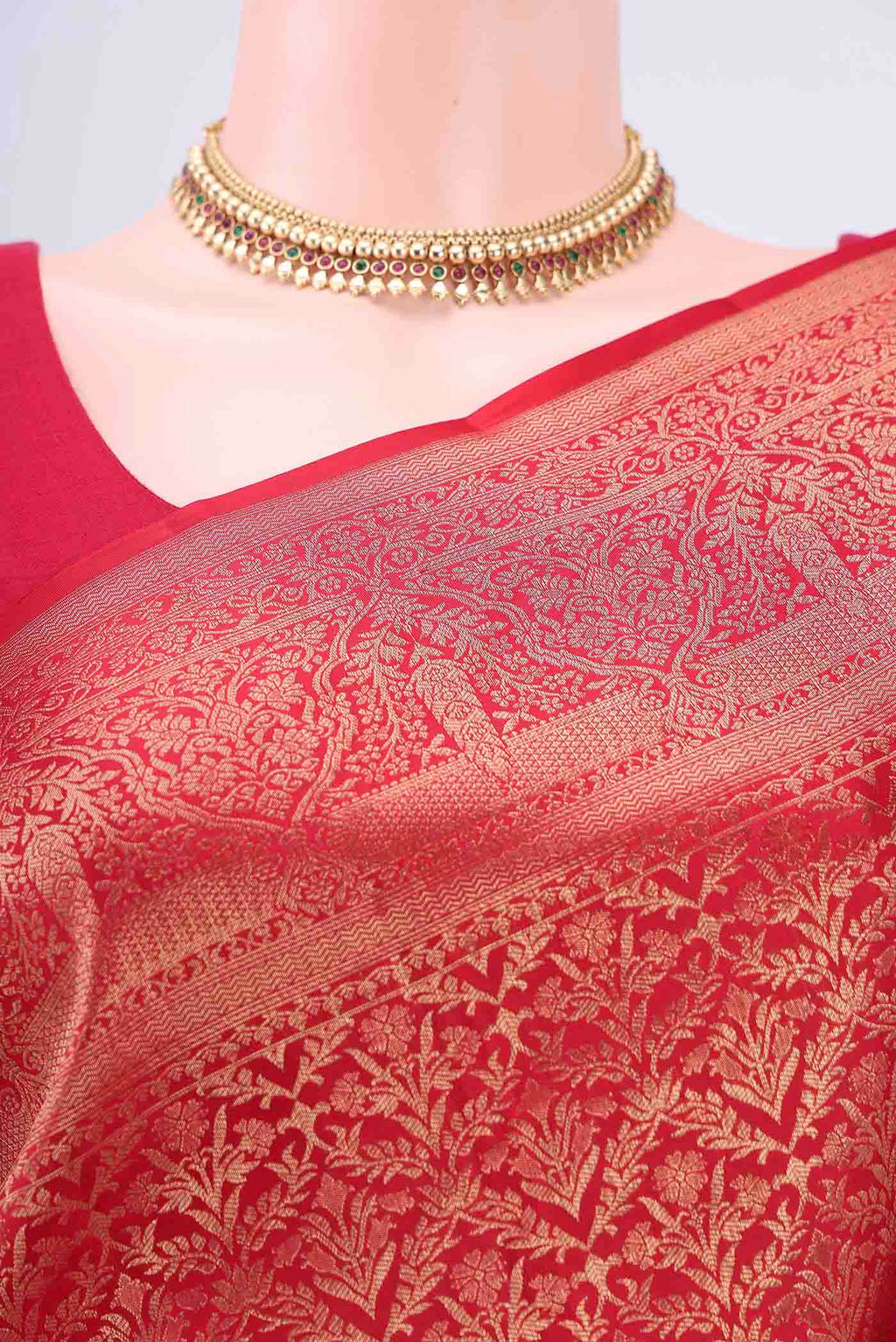 Border image of Maroon Soft Silk Saree with Zari Brocade on the body and Zari Border. 
