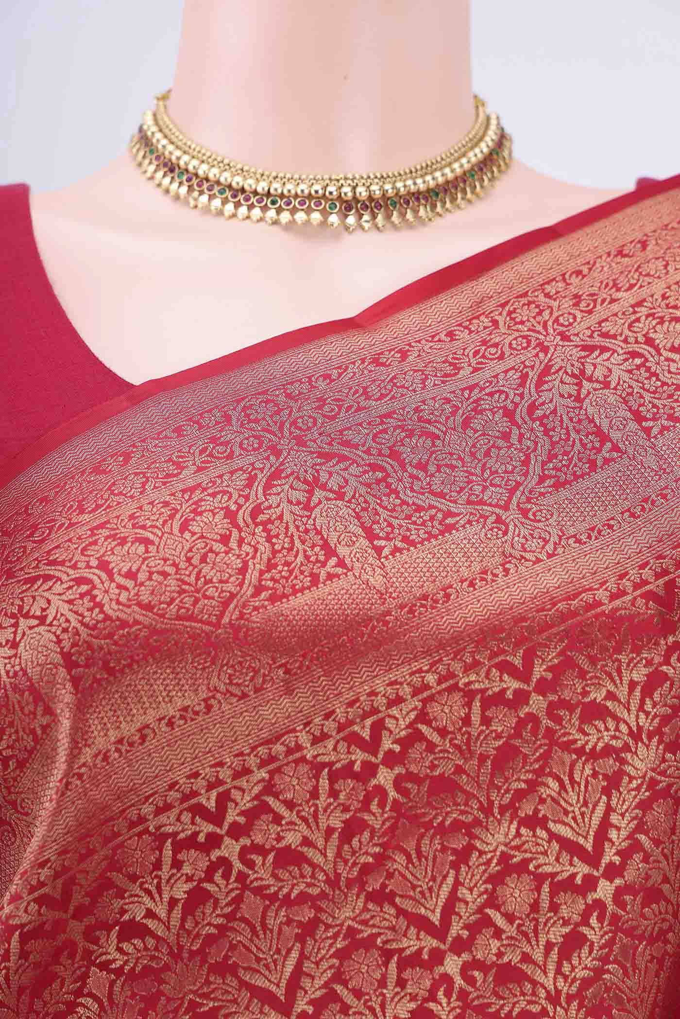 Border image of Maroon Soft Silk Saree with Zari Brocade on the body and Zari Border. 