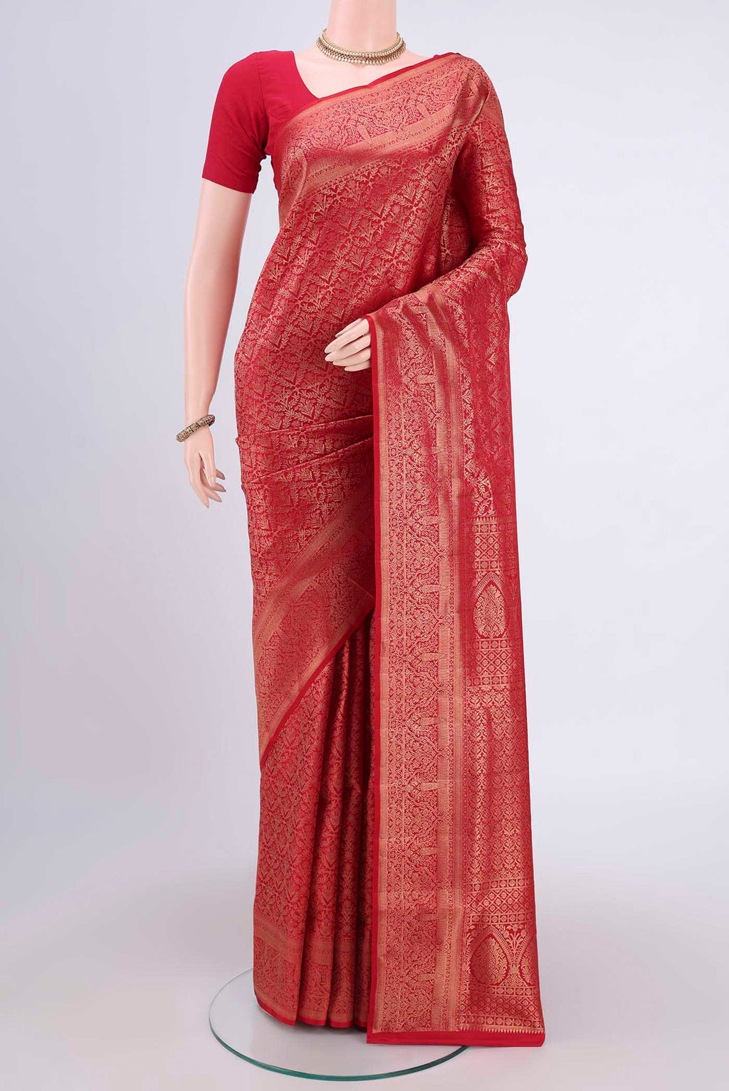 Maroon Soft Silk Saree with Zari Brocade on the body and Zari Border.  displayed on a mannequin