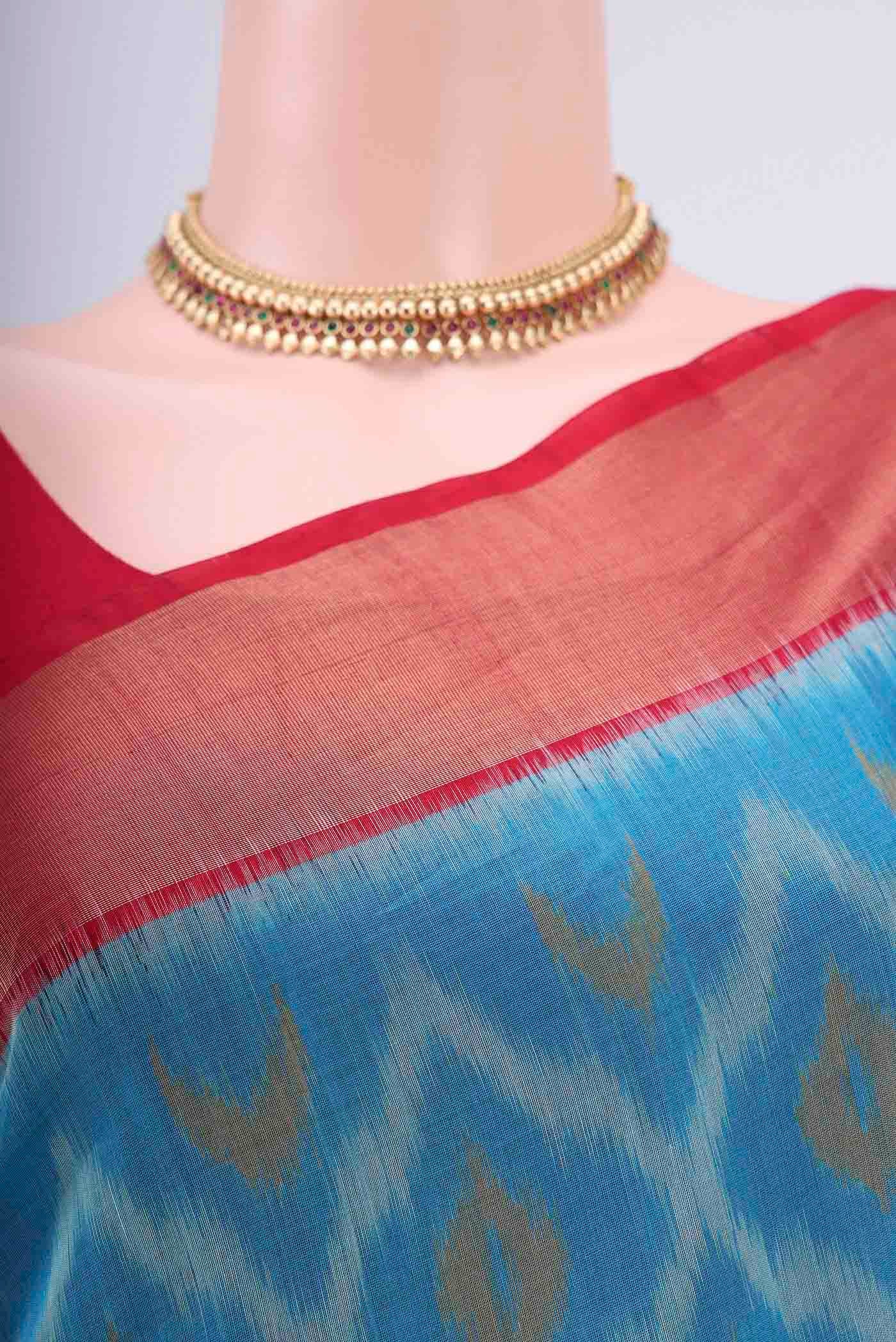 Border image of Blue Kora Cotton Saree with Ikat design on the body and Zari Border