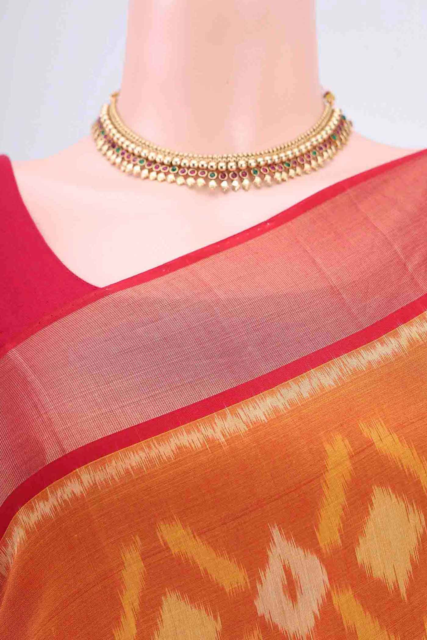 Border image of Brick Orange Kora Cotton Saree with Ikat design on the body and Zari Border