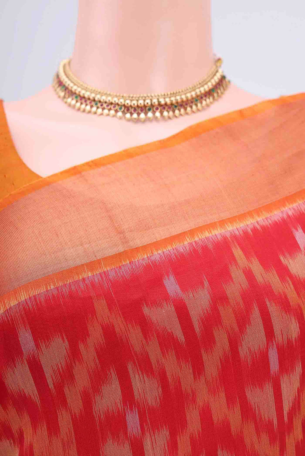 Border image of Red Pochampally Saree with Ikat design on the body and Zari Border