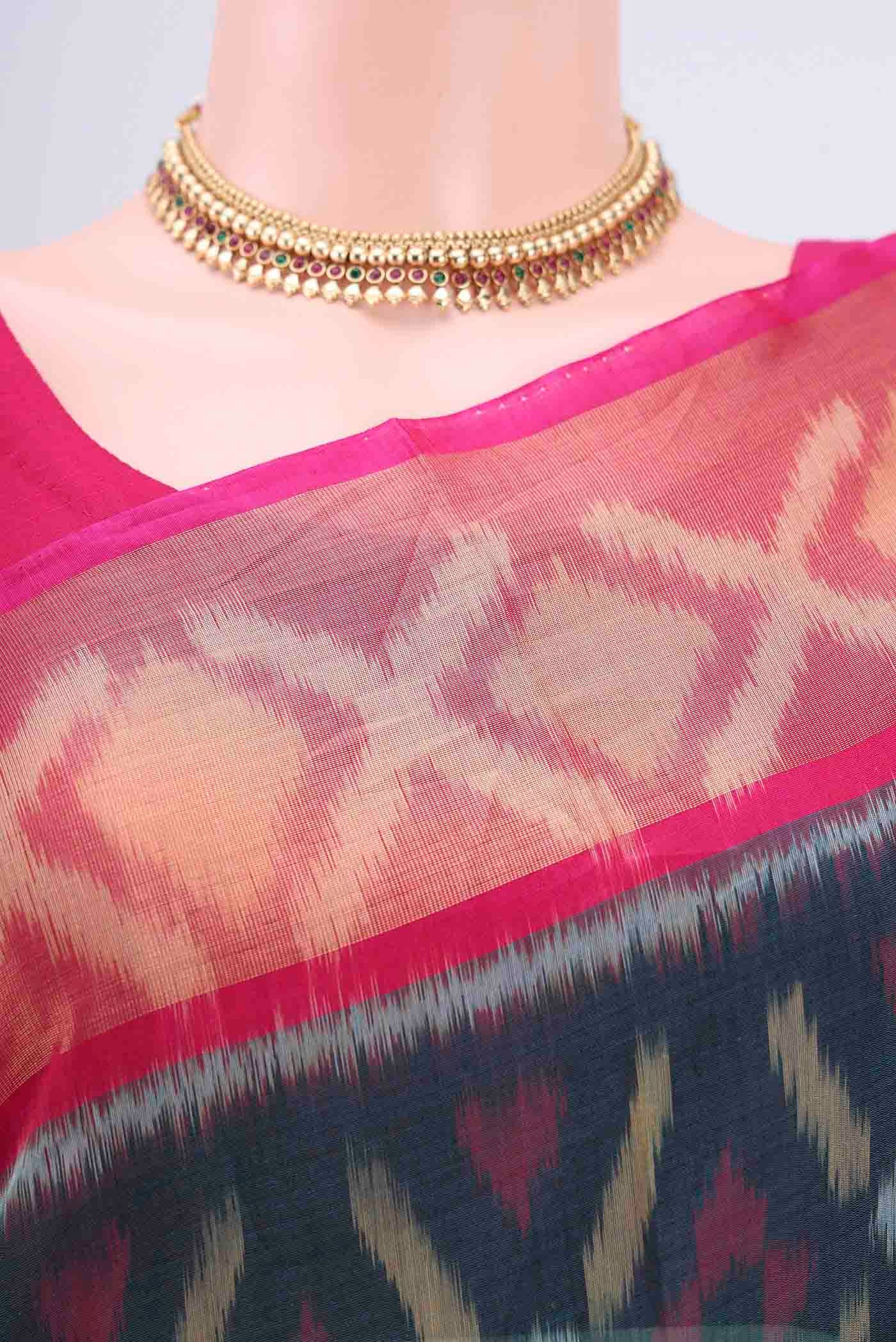 Border image of Peacock Blue Kora Cotton Saree with Ikat design on the body and Zari Border