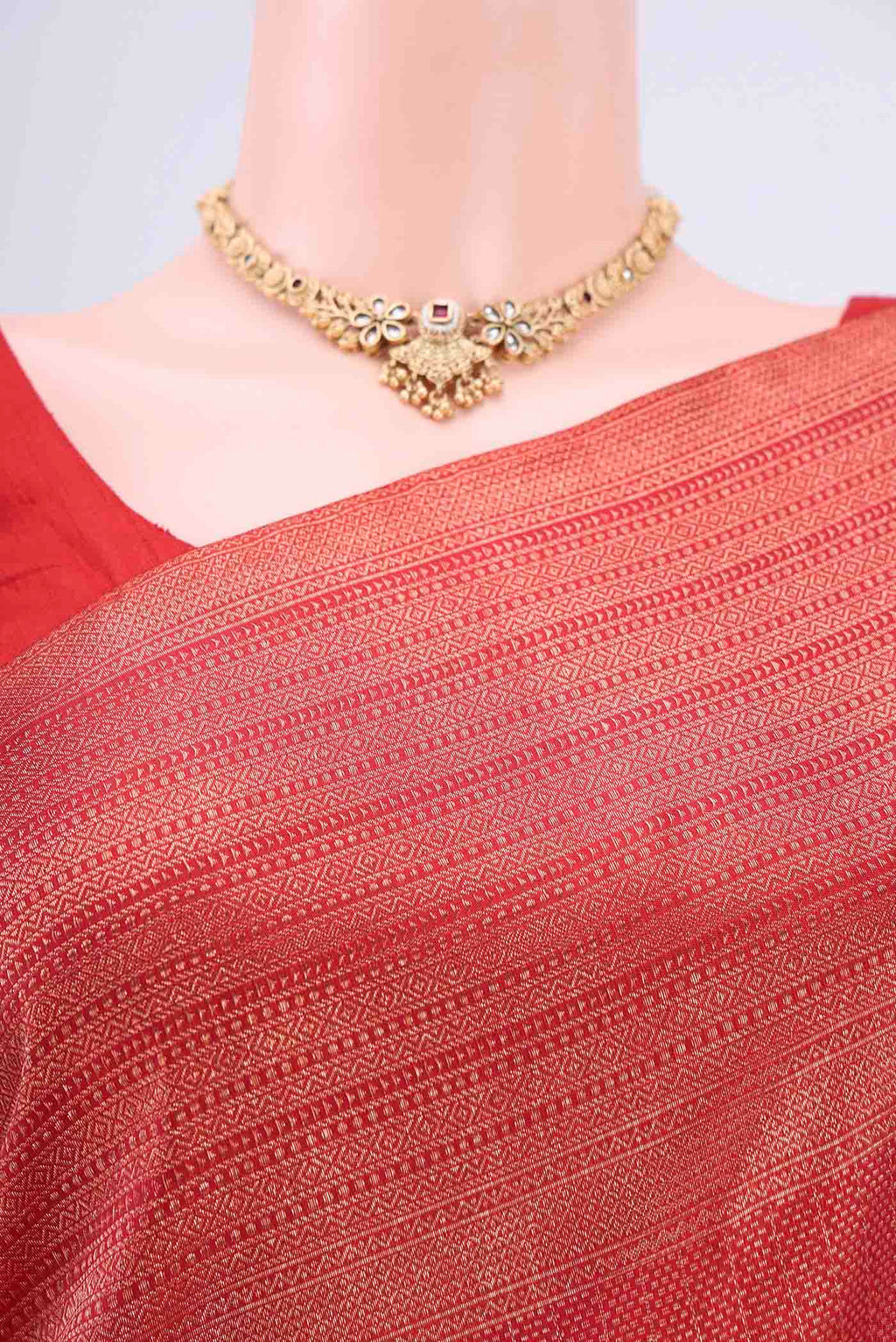 Border image of Red Dual Tone Kanchipuram Saree with Zari Brocade on the body and Zari Border