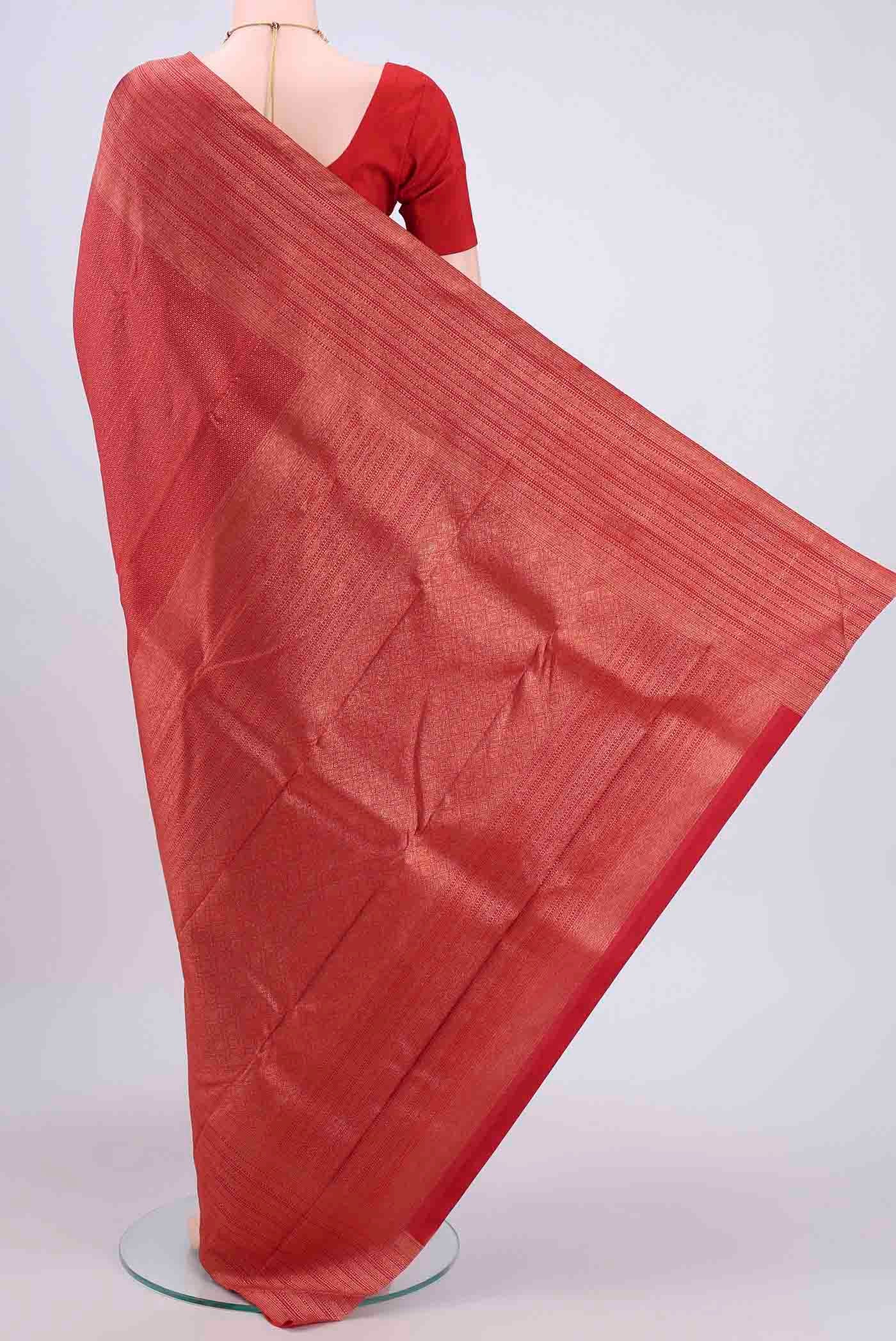 Flat view of Red Dual Tone Kanchipuram Saree with Zari Brocade on the body and Zari Border