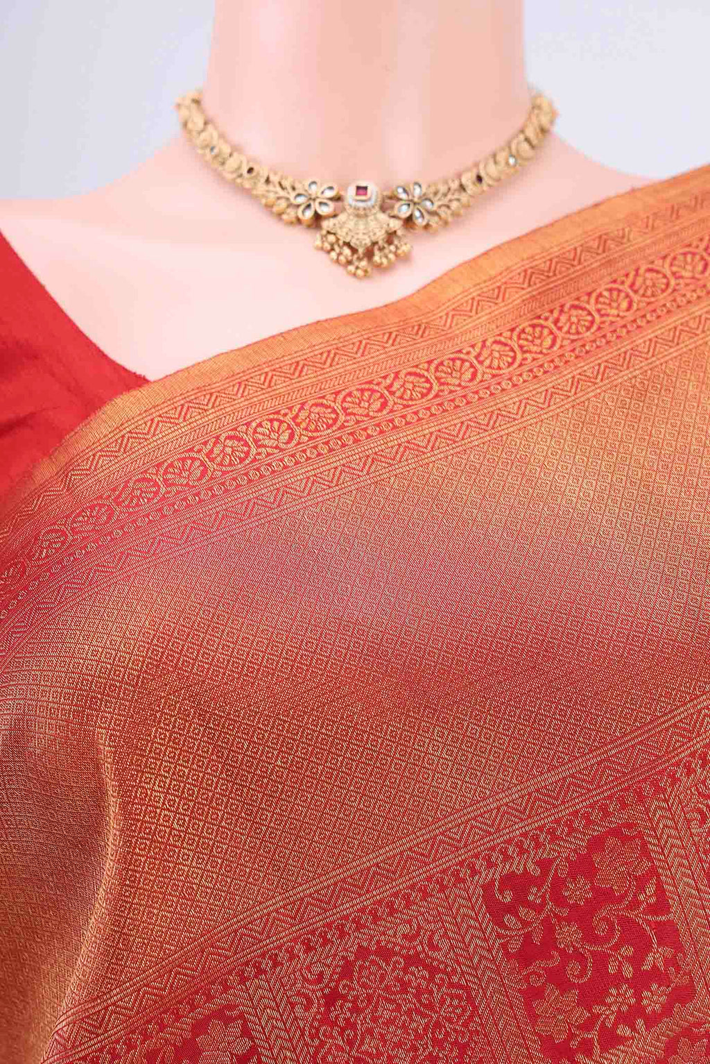 Border image of Red Dual Tone Kanchipuram Saree with Zari Brocade on the body and Zari Border