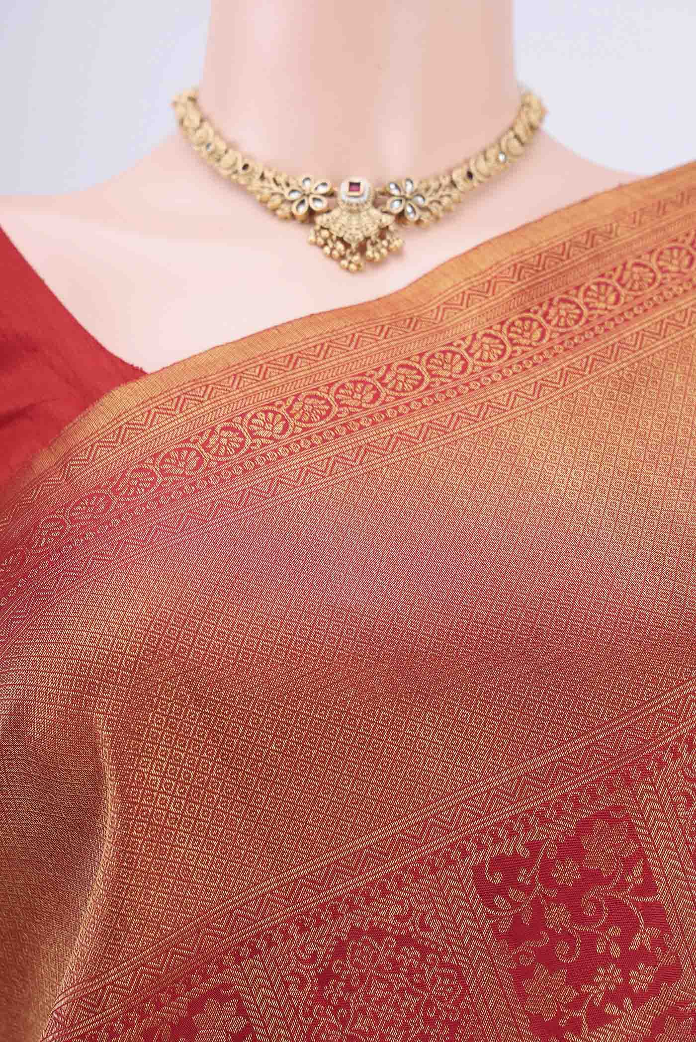 Border image of Red Dual Tone Kanchipuram Saree with Zari Brocade on the body and Zari Border