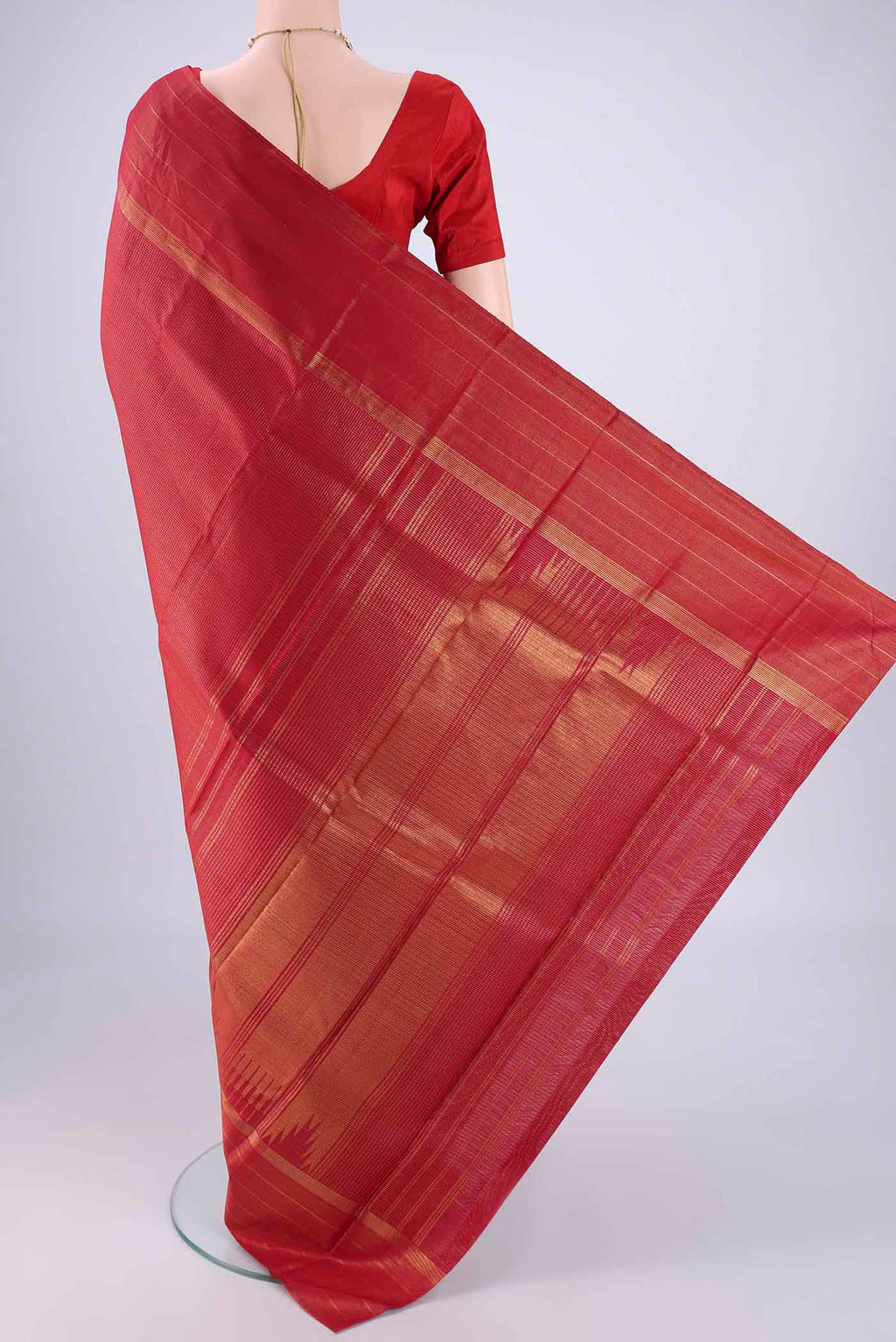 Flat view of Maroon Kanchipuram Silk Saree with Checked design on the body and Zari Border. 