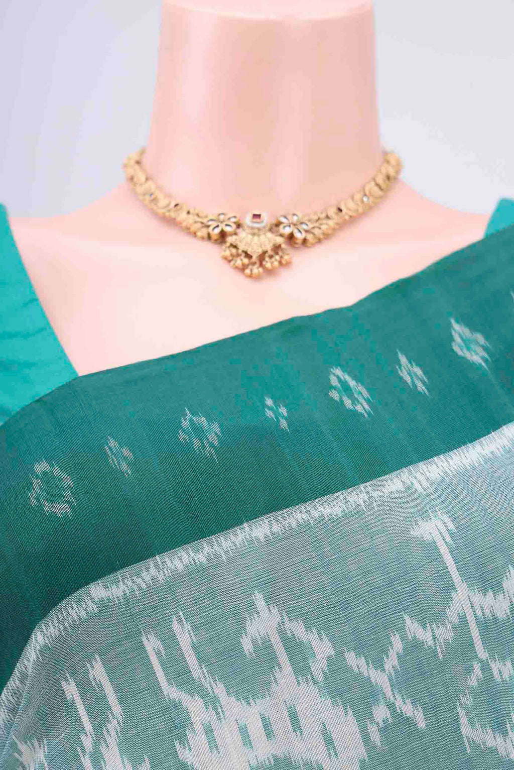 Border image of Sea Green Pochampally Cotton Saree with Ikat design on the body and Ikat Border. 