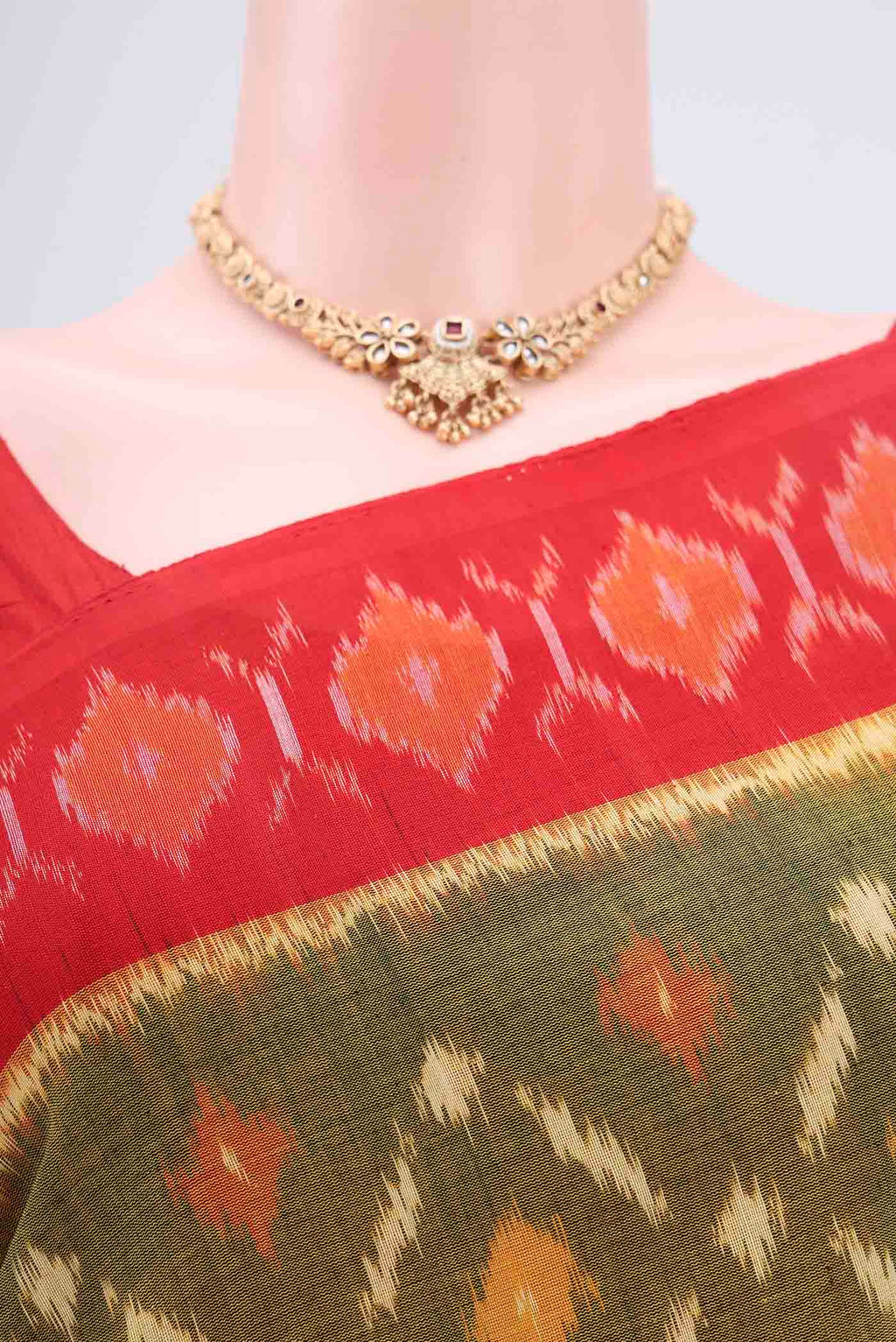 Border image of Mehandi Green Pochampally Cotton Saree with Ikat design on the body and Ikat Border. 