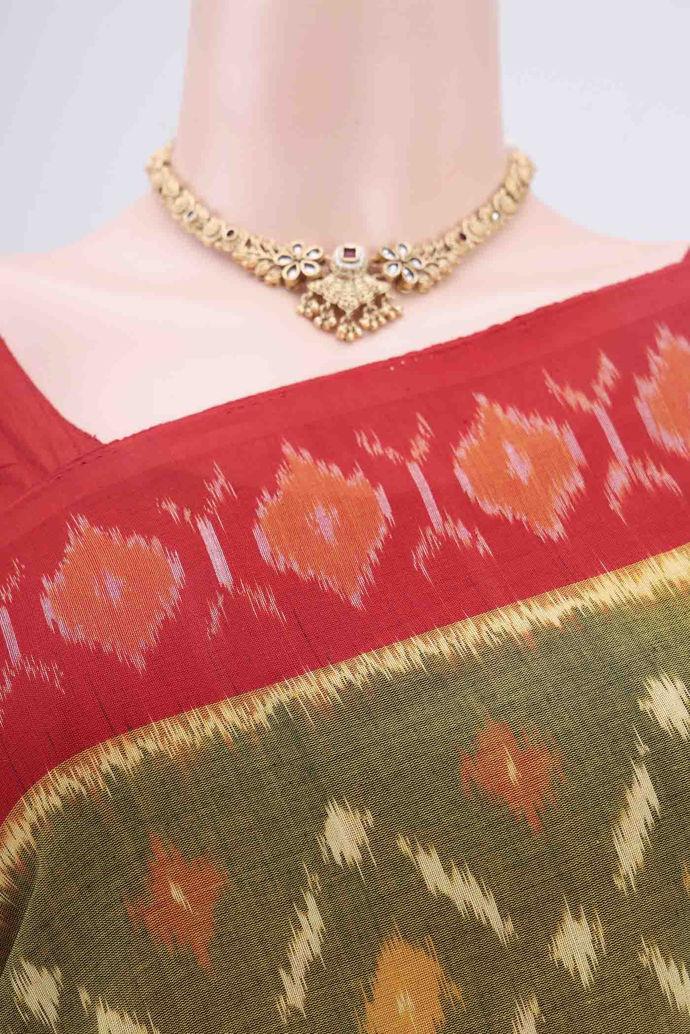 Border image of Mehandi Green Pochampally Cotton Saree with Ikat design on the body and Ikat Border. 