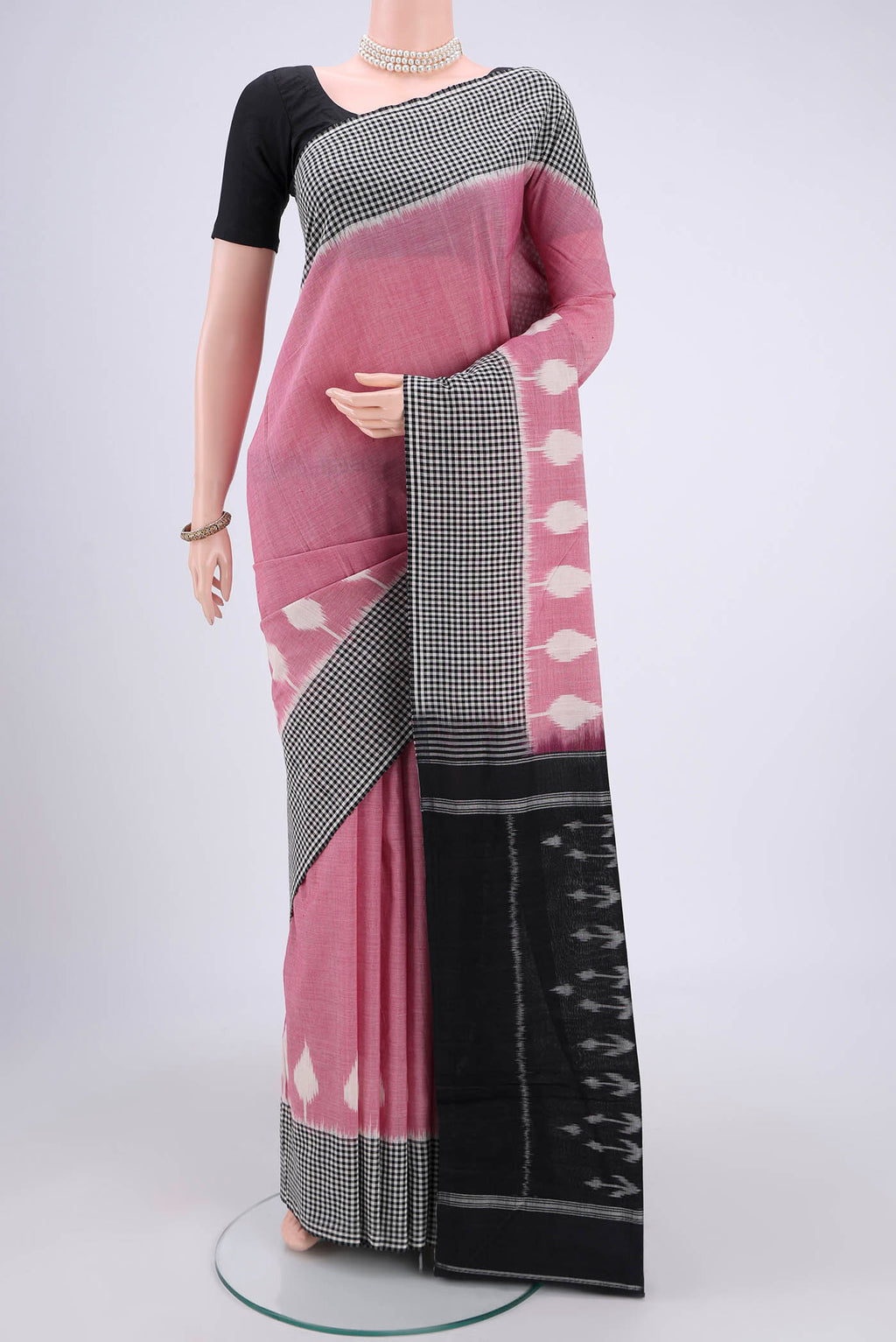 Pink Dual Tone Pochampally Cotton Saree with Ikat design on the body and Ikat Border.  displayed on a mannequin
