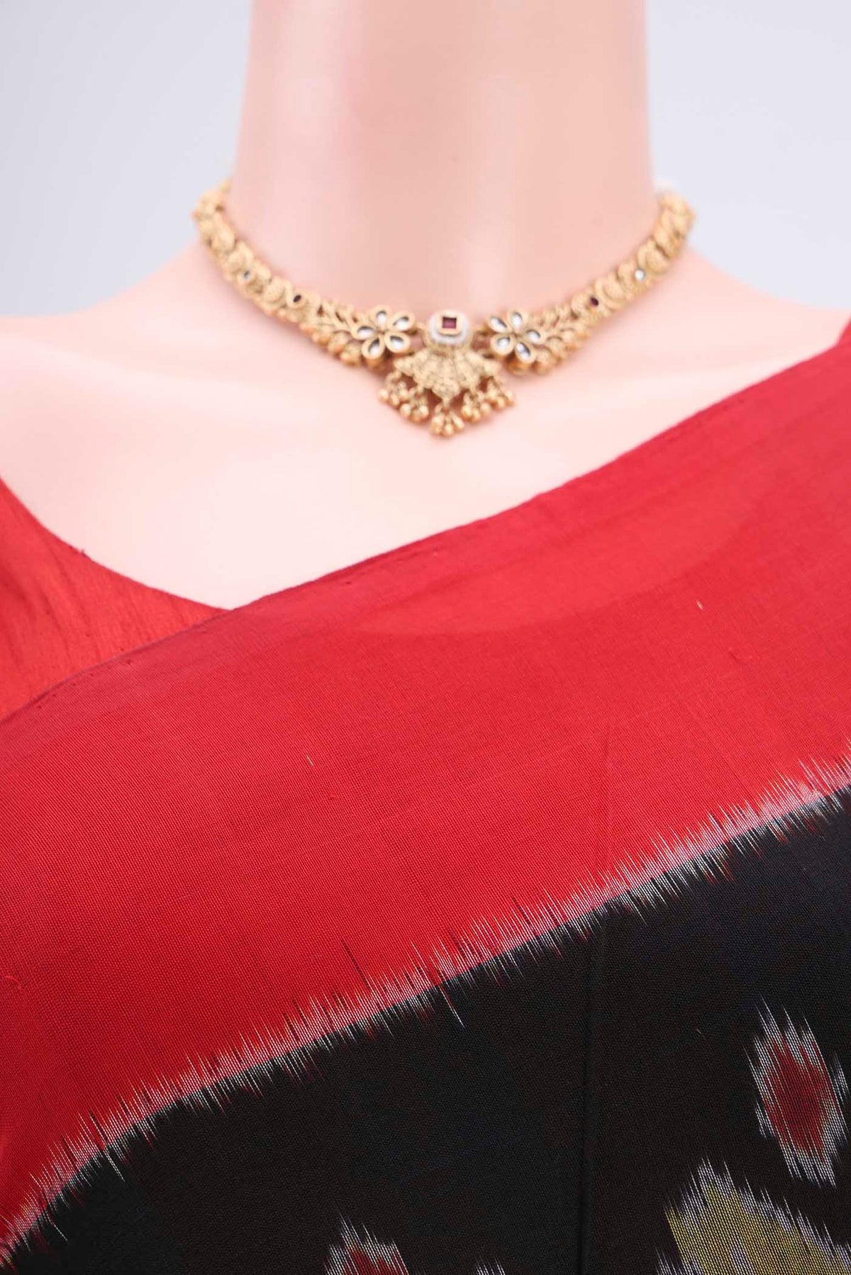 Border image of Black Pochampally Cotton Saree with Ikat design on the body and Ikat Border. 